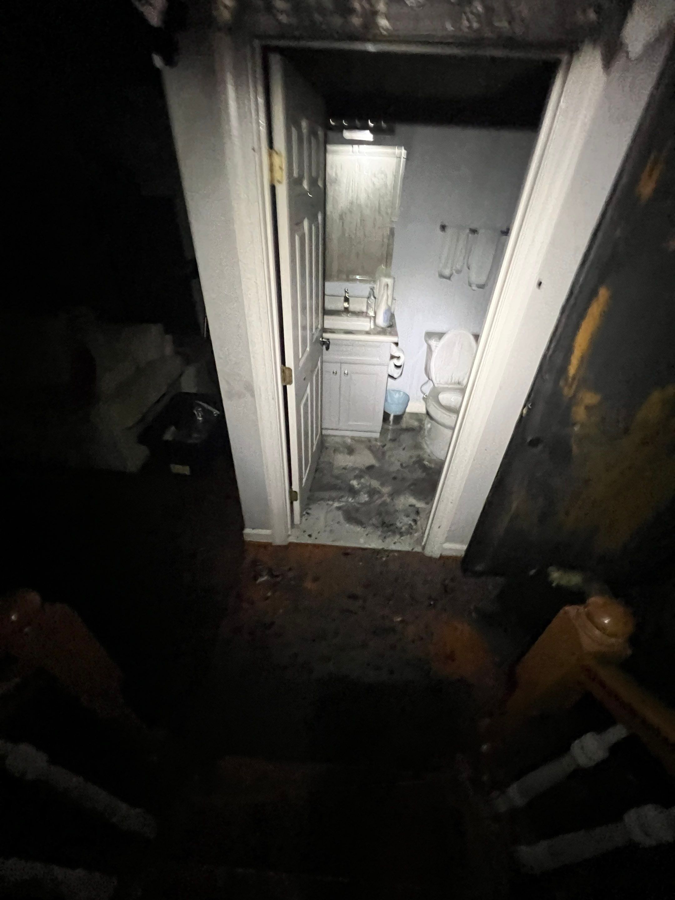 Initial fire damage assessment in Arlington showing soot and smoke residue on interior surfaces.