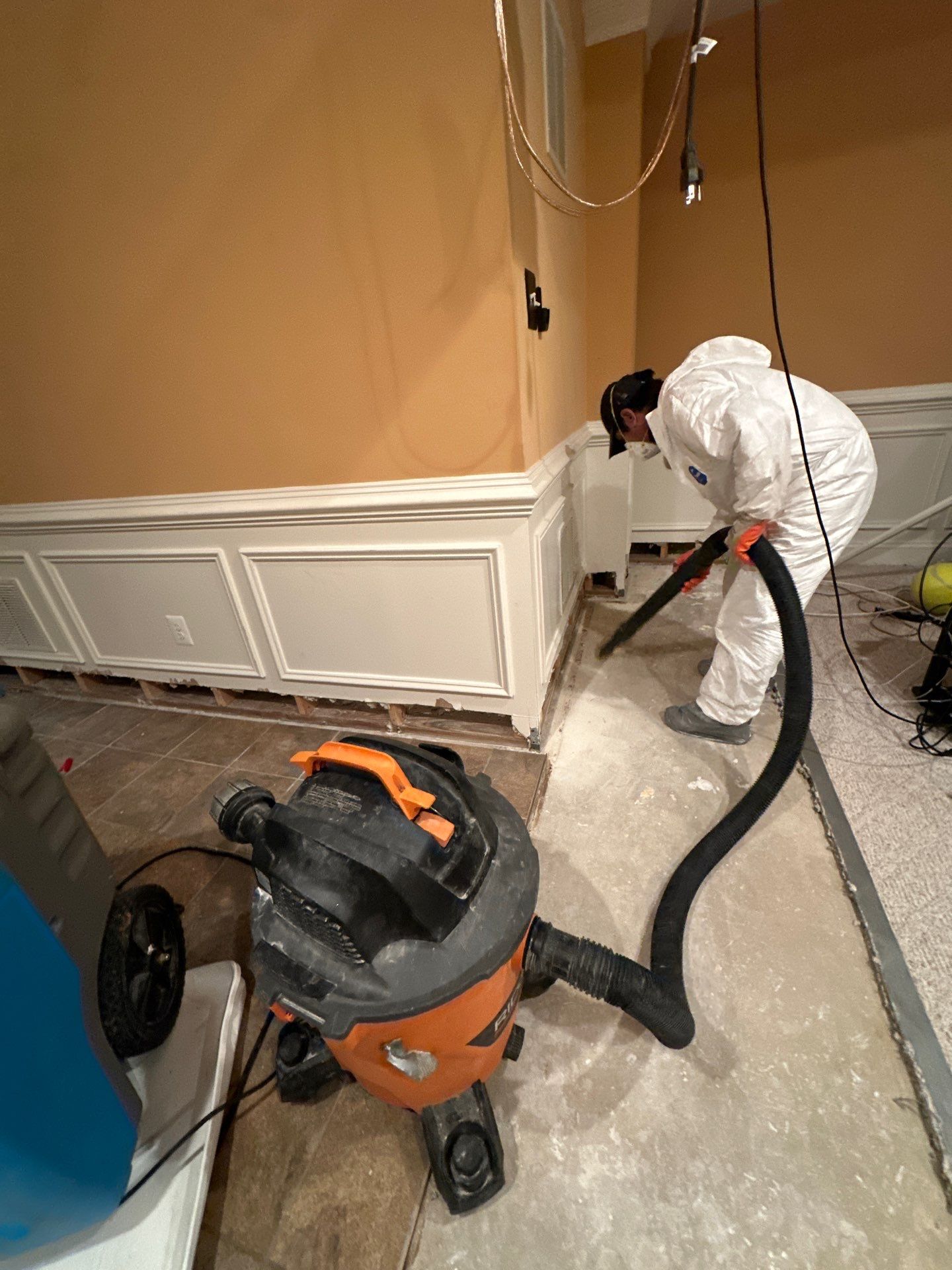 Final drying phase complete, flooring area cleared and structural integrity restored after water extraction and remediation.