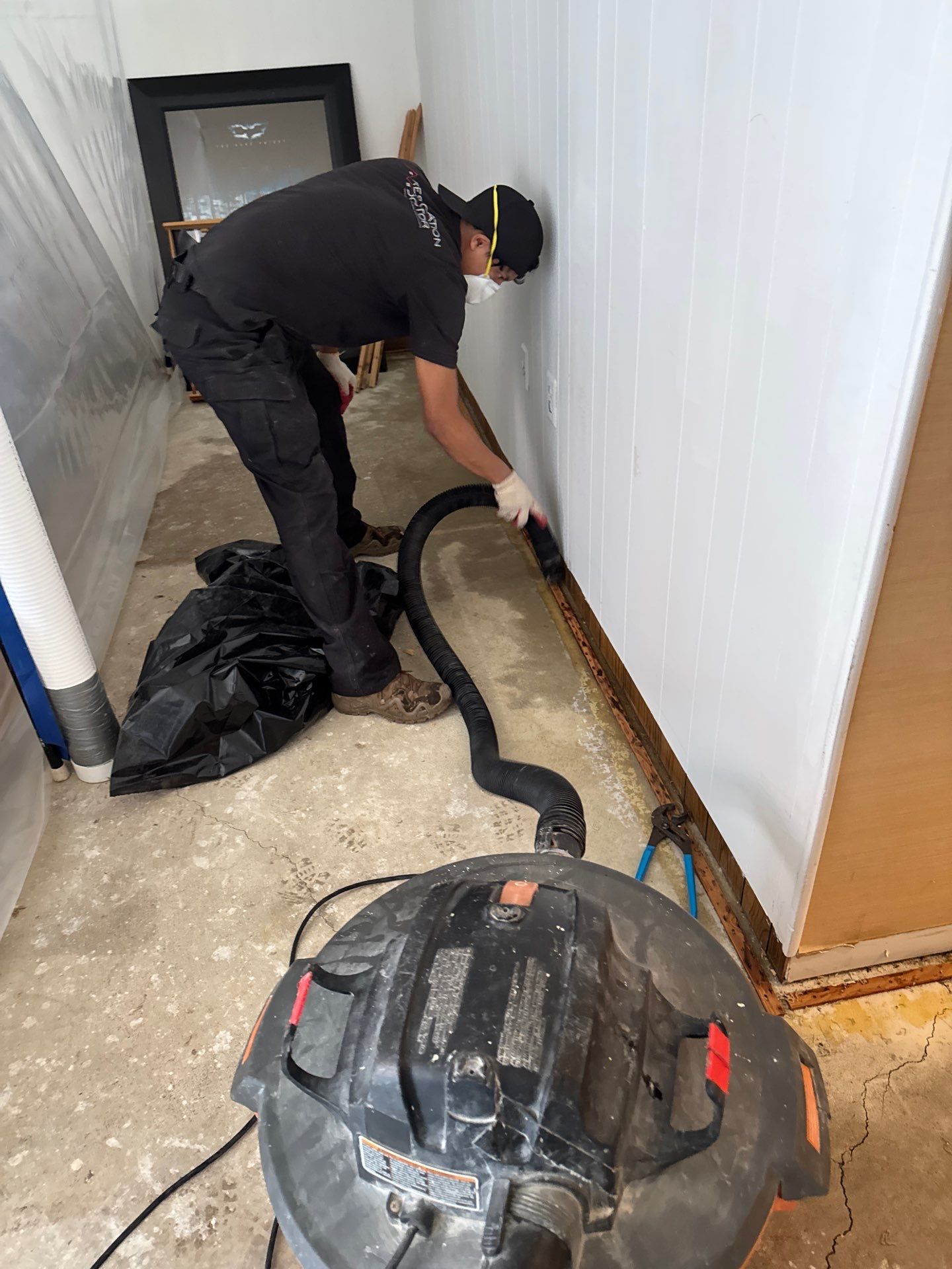 Standing water extraction underway during mold remediation in McLean, Virginia.