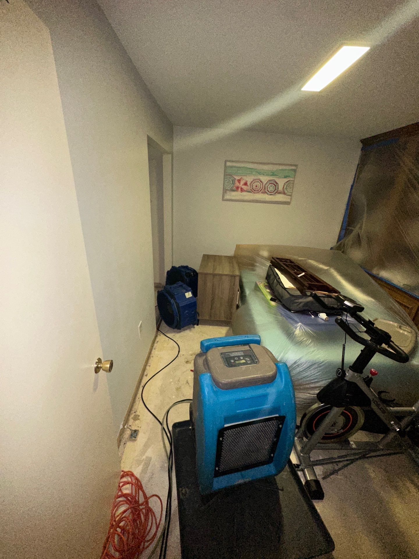 Structural drying equipment positioned to remove moisture from affected areas.
