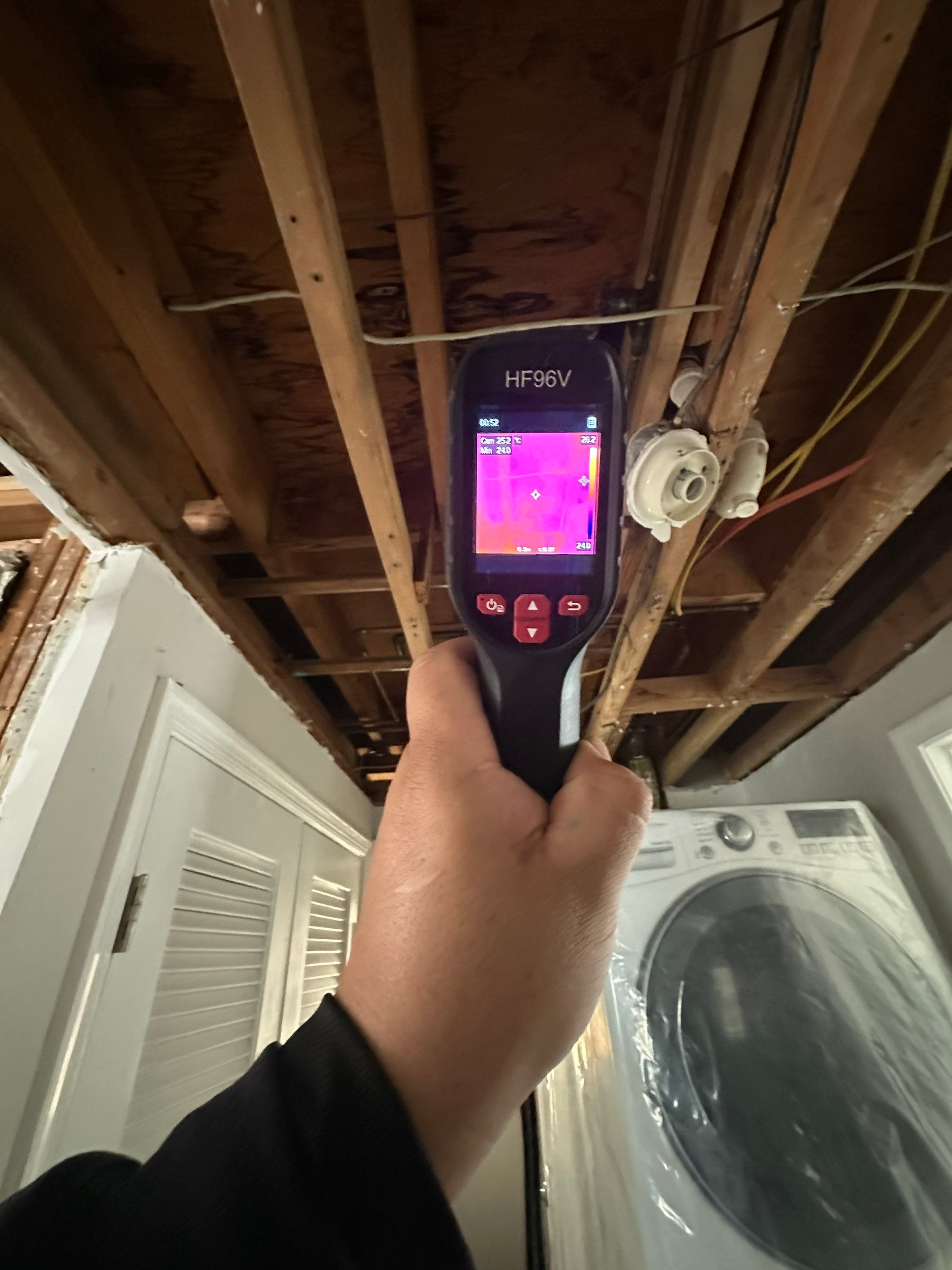 Dehumidification equipment positioned for structural drying during mold remediation work.