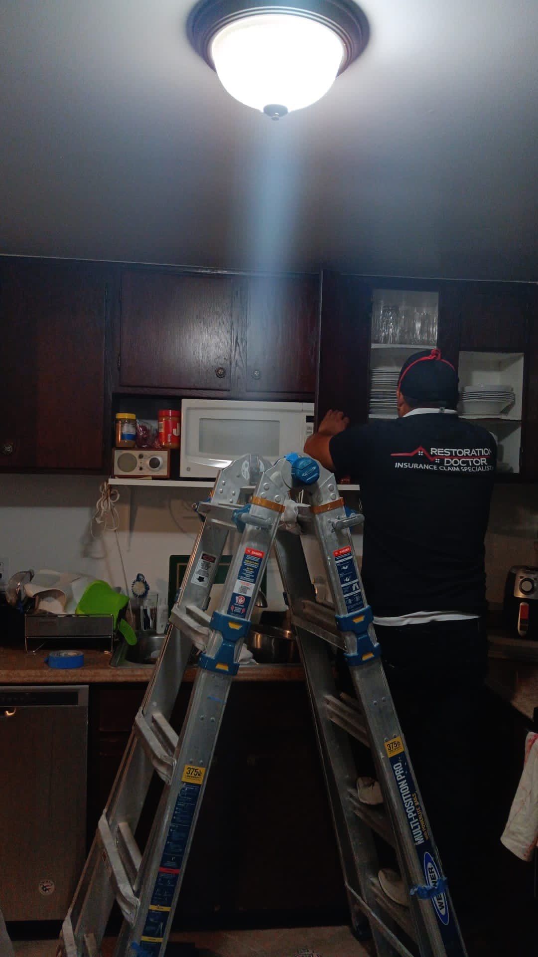 Thermal imaging camera documenting moisture distribution during water damage restoration in Falls Church.