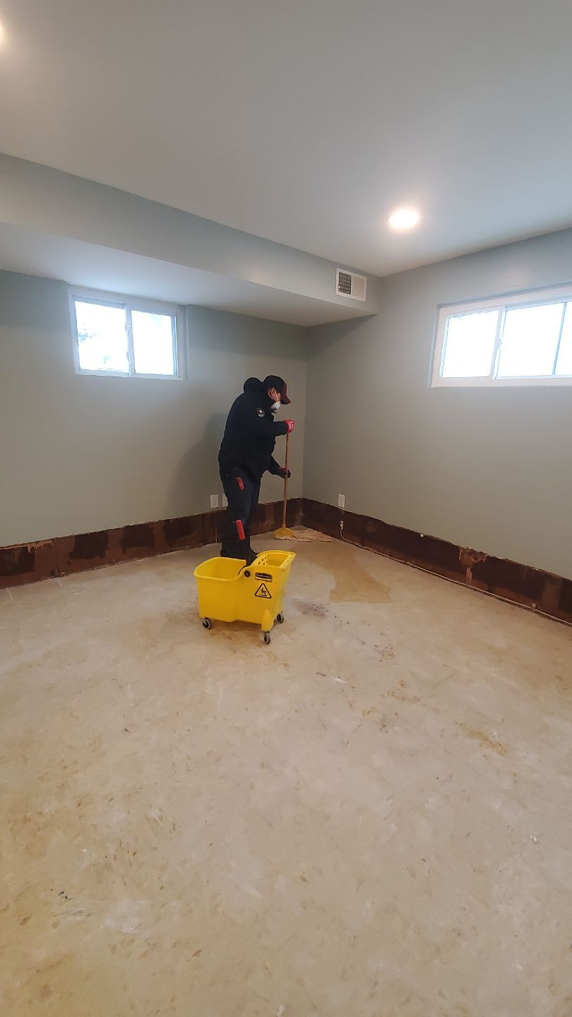Continued dehumidification and structural drying in progress at water damage site.