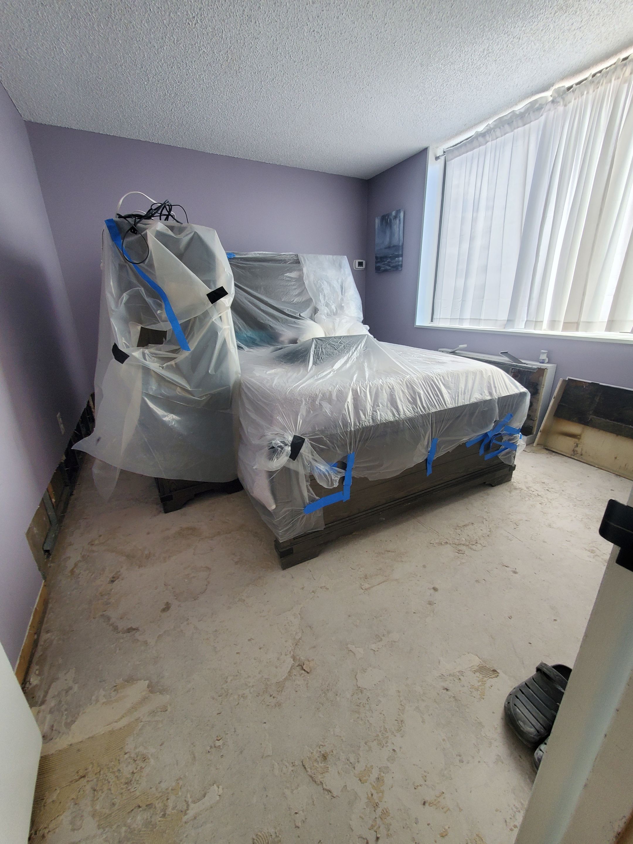 Thermal imaging inspection documenting moisture distribution across wall and floor surfaces during active drying phase.