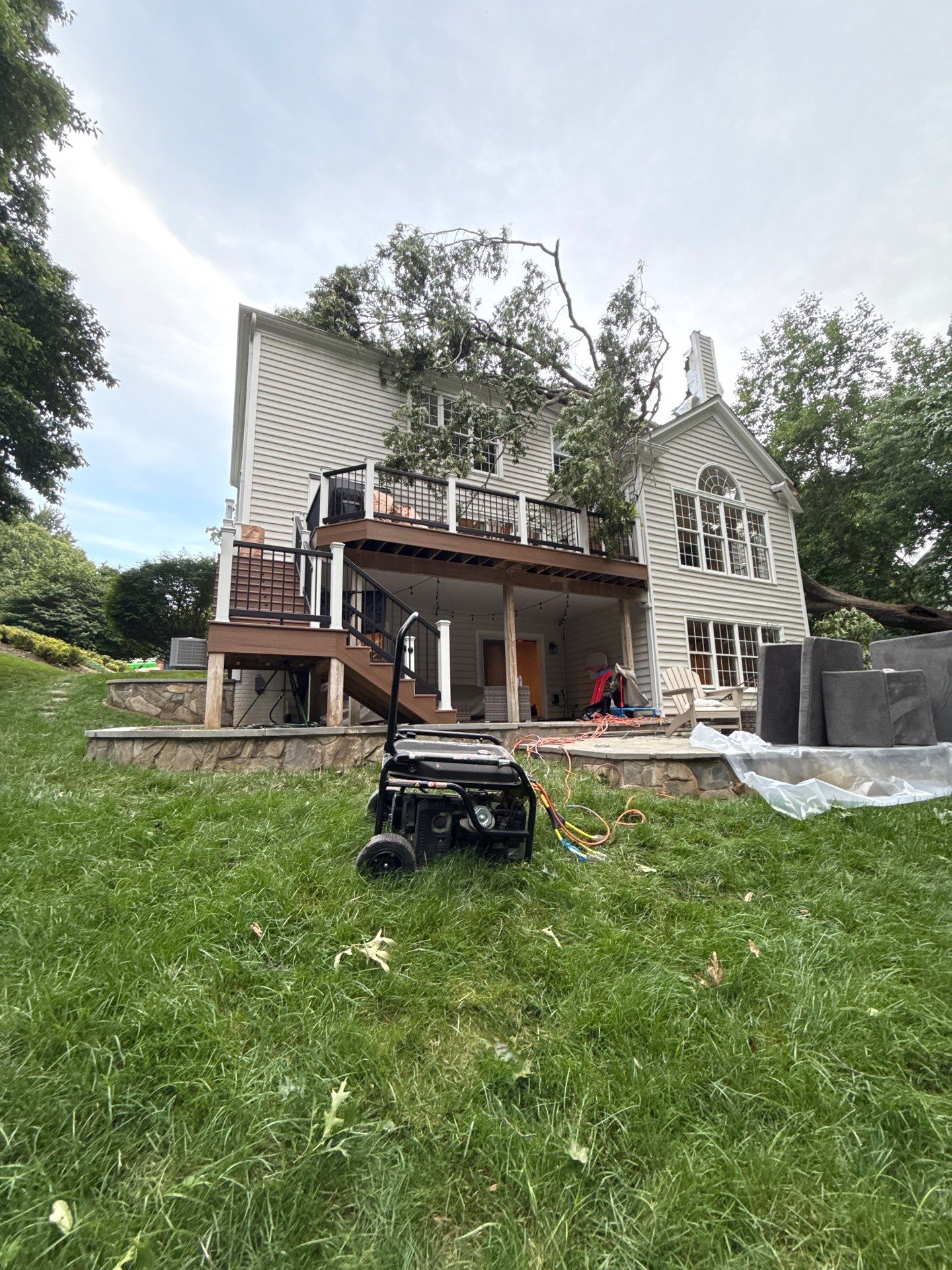 Ceiling damage assessment and preparation for repair work following water extraction in Oakton home.