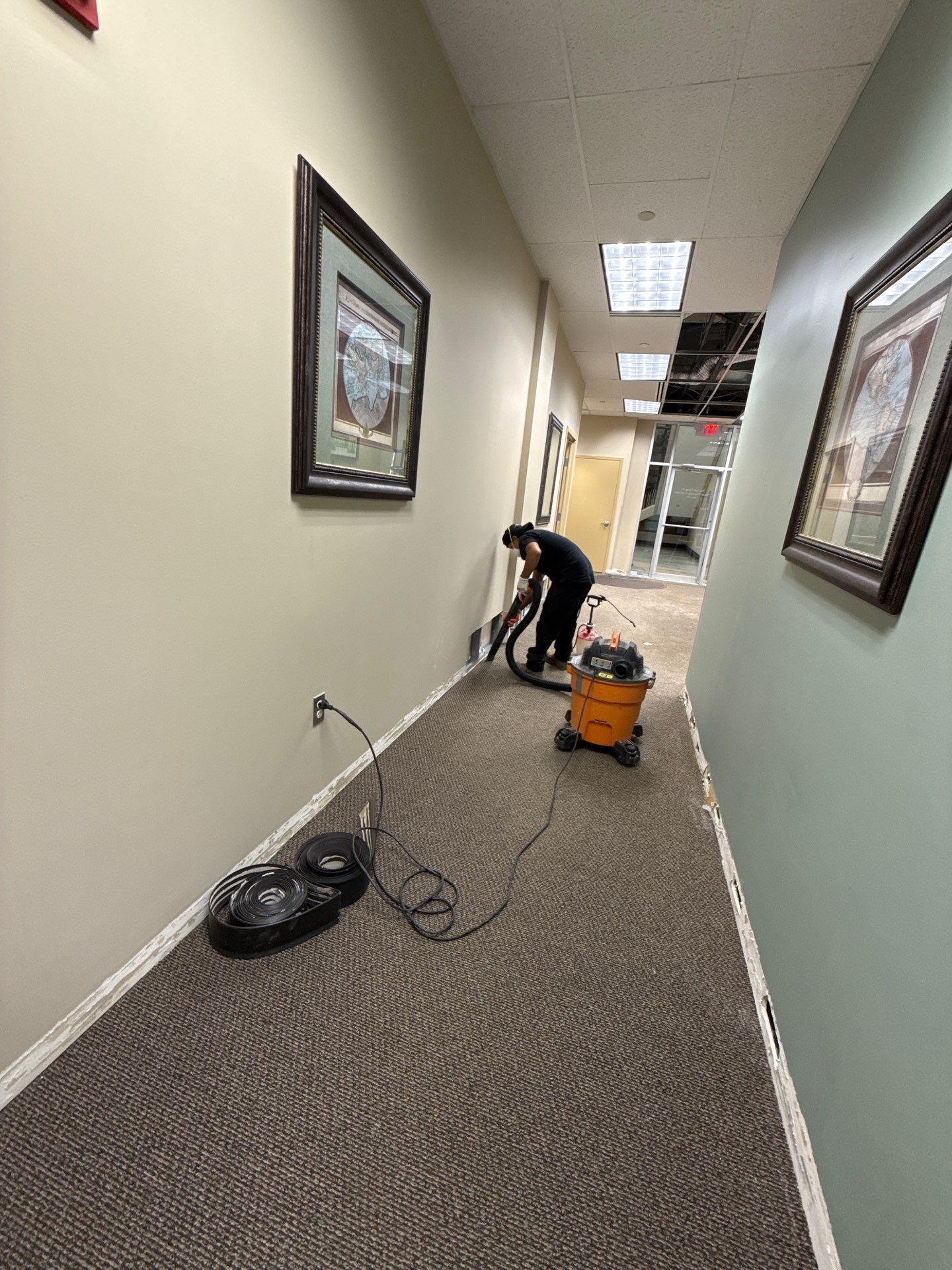 Restored ceiling and baseboard reinstalled after water damage restoration in Reston.