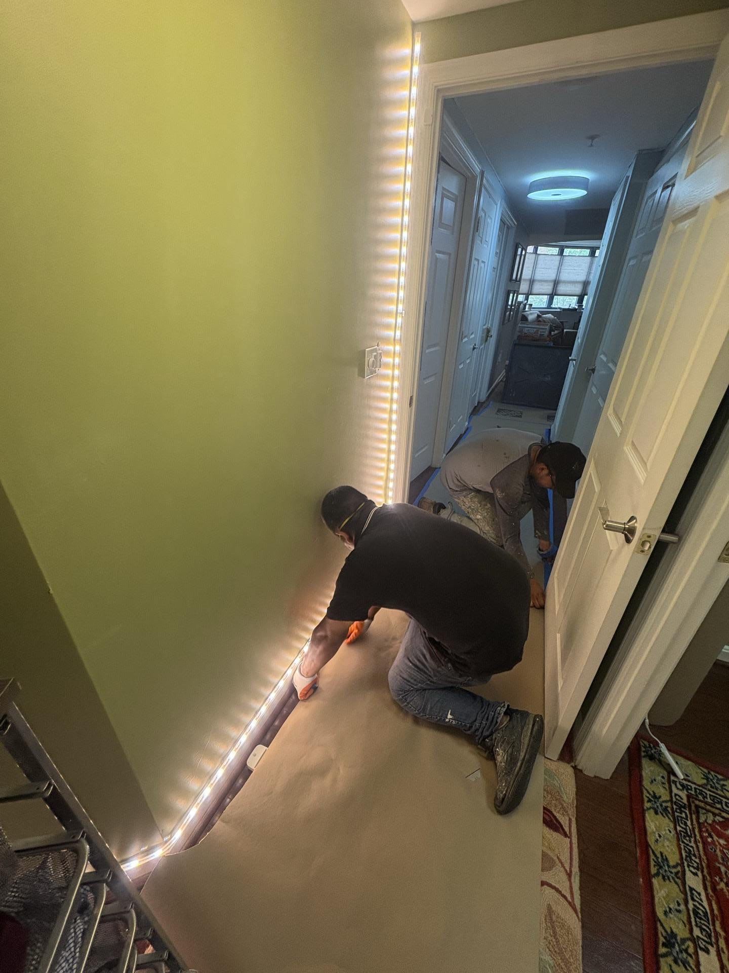 Water damage restoration underway in Arlington: drying equipment positioned to manage structural moisture and protect remaining contents.