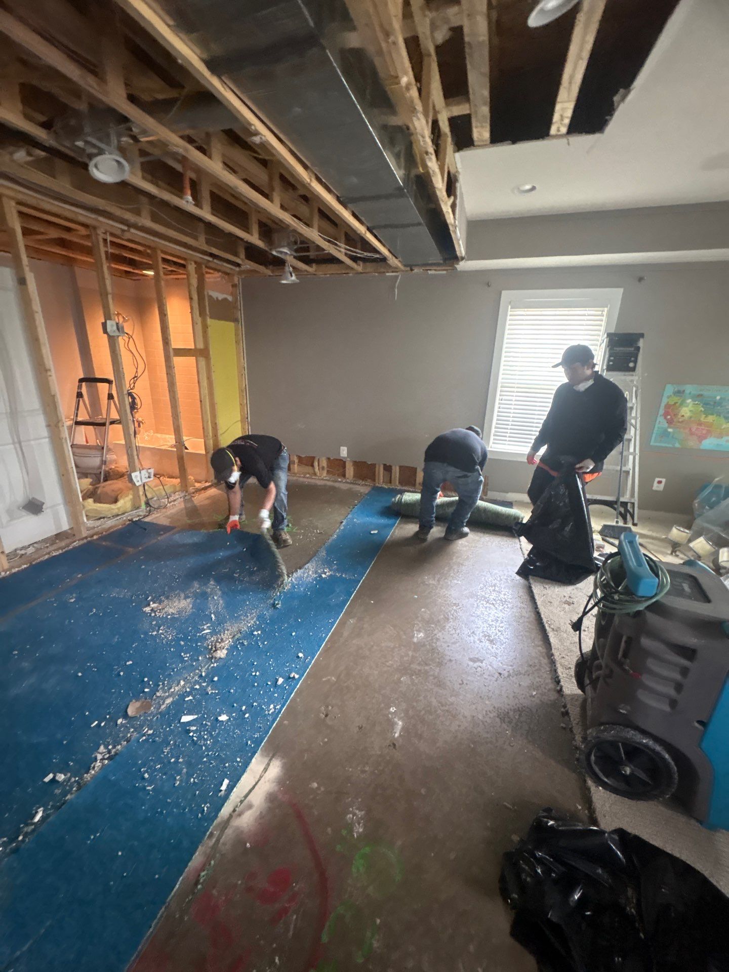 Ceiling cavity inspection and monitoring during active drying phase of water restoration work.