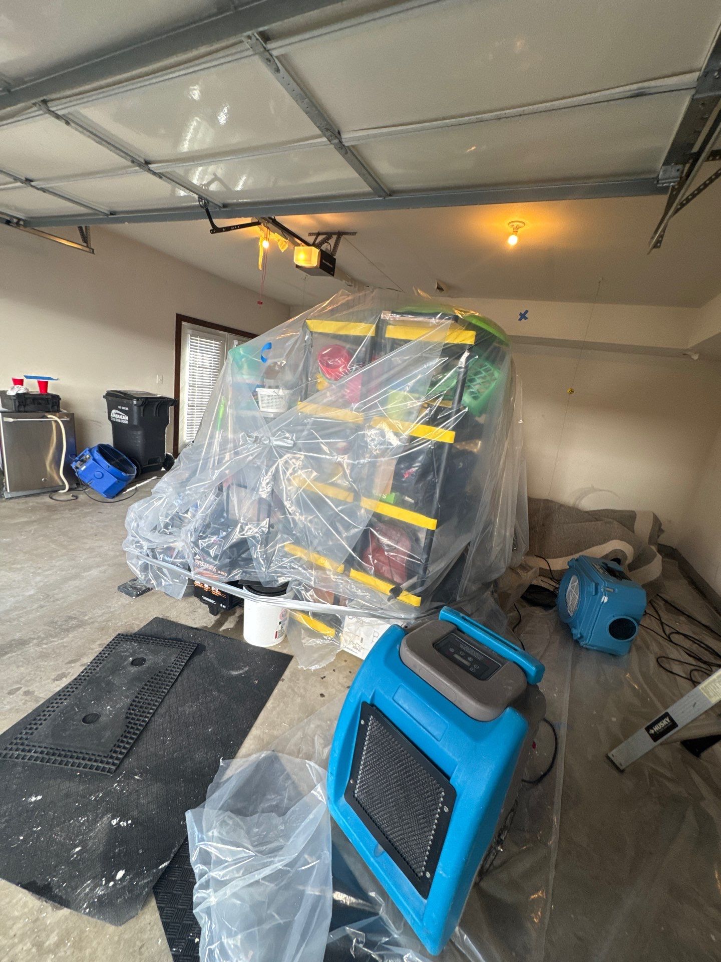 Water damage restoration in Sterling: drywall removal and structural exposure for moisture assessment and drying.