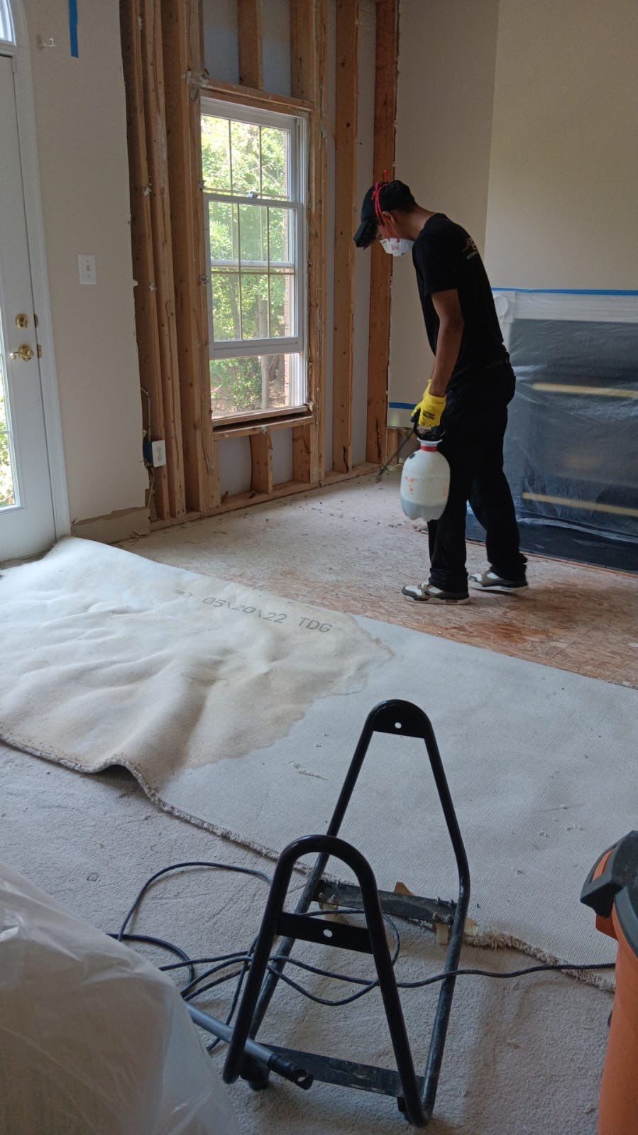 Mid-stage drying setup showing extraction equipment and dehumidification units managing moisture removal.