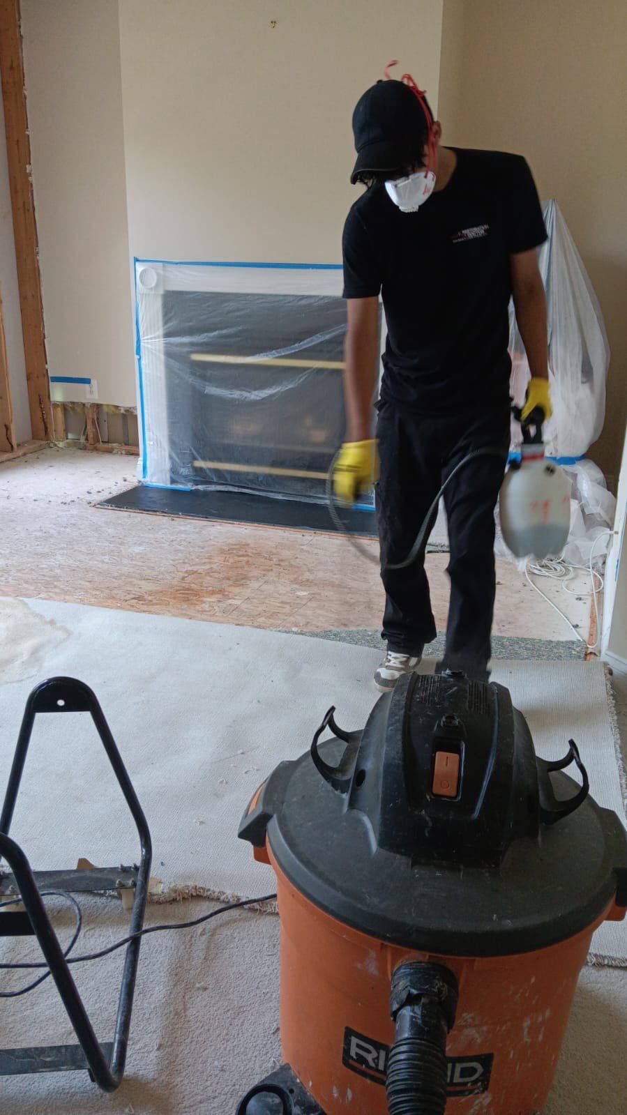 Dehumidifiers and air movers deployed across affected space during Arlington water restoration drying phase.