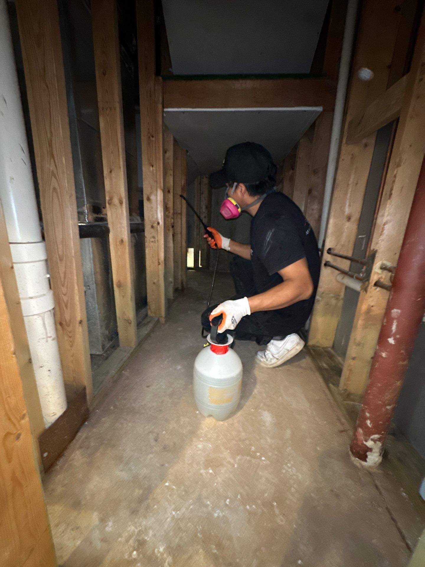 Dehumidification equipment positioned for structural drying during moisture remediation.