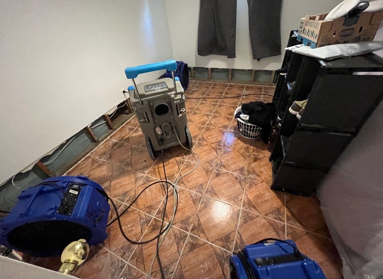 Final-stage structural drying in Falls Church, equipment removal and moisture verification complete.