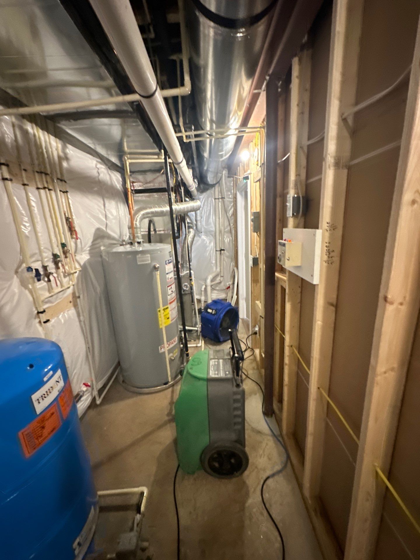 Drying equipment positioned to manage moisture and prevent mold growth.