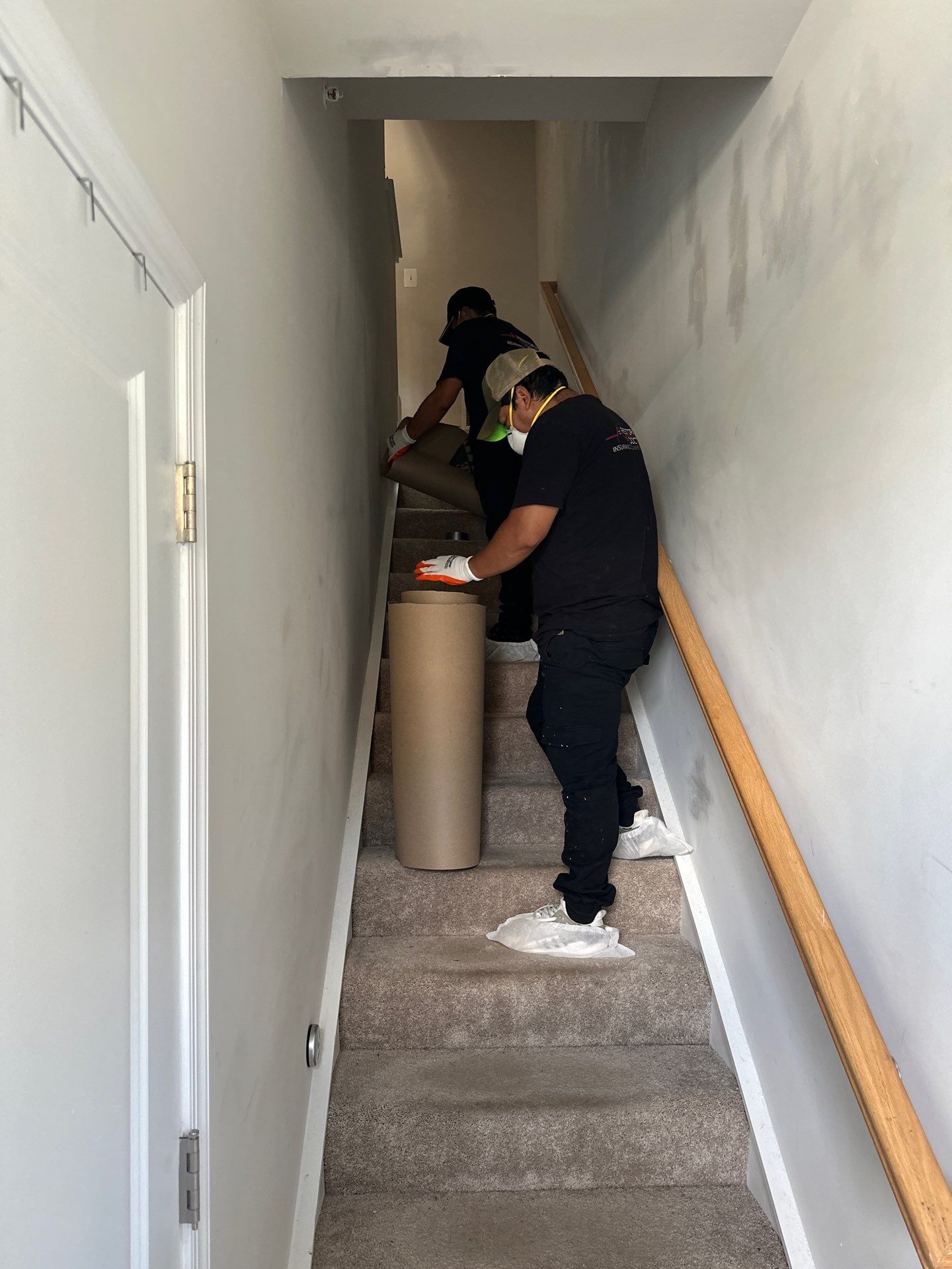 Containment barrier installed during water damage restoration in Ashburn, with thermal imaging equipment positioned for moisture mapping.