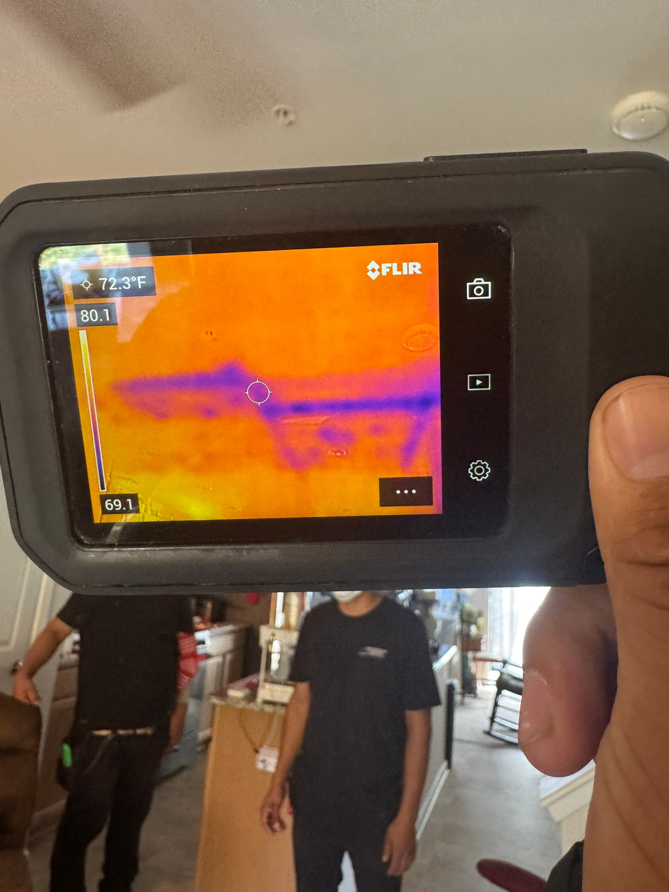 Final-stage moisture inspection using thermal imaging to verify drying completion in Ashburn restoration.