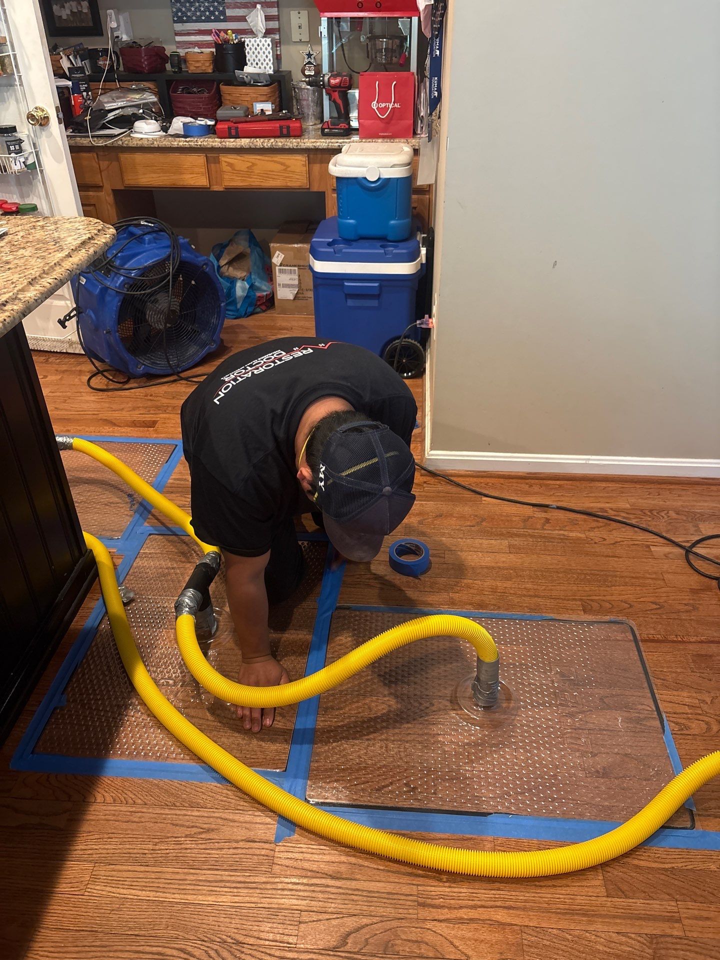 Advanced drying phase with dehumidification equipment monitoring moisture levels in flooring and structural cavities.