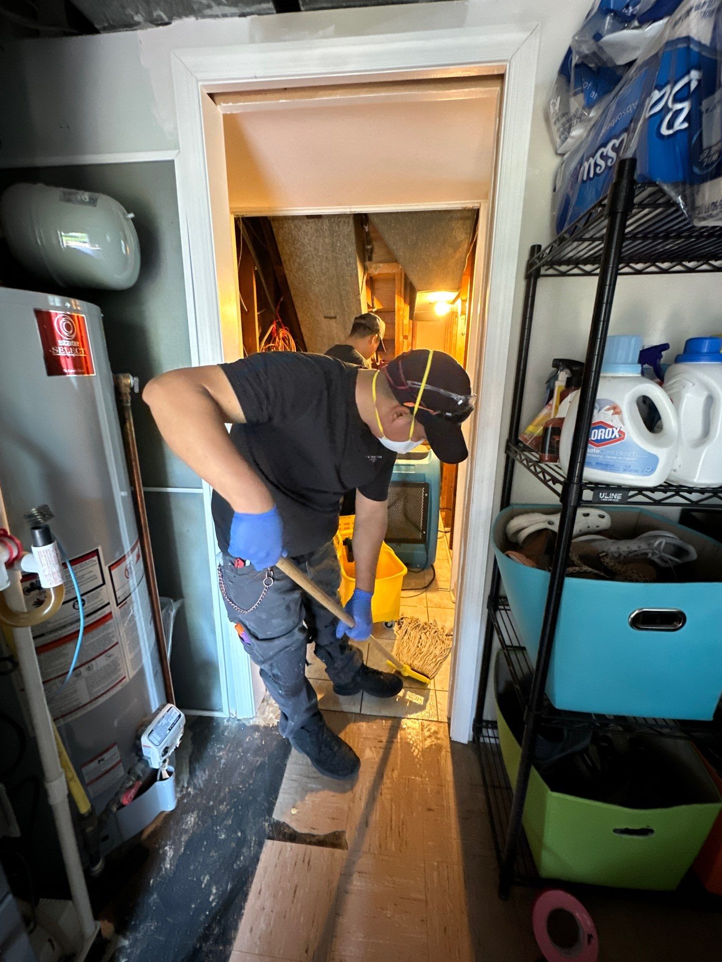 Advanced drying phase with dehumidifiers and ventilation systems maintaining controlled conditions for complete structural moisture extraction.