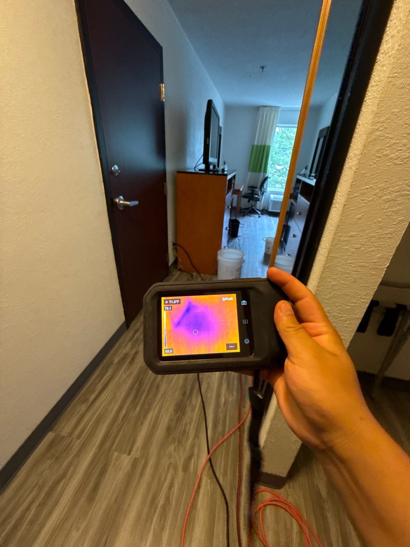 Final thermal imaging verification confirming moisture remediation in Manassas water damage restoration.