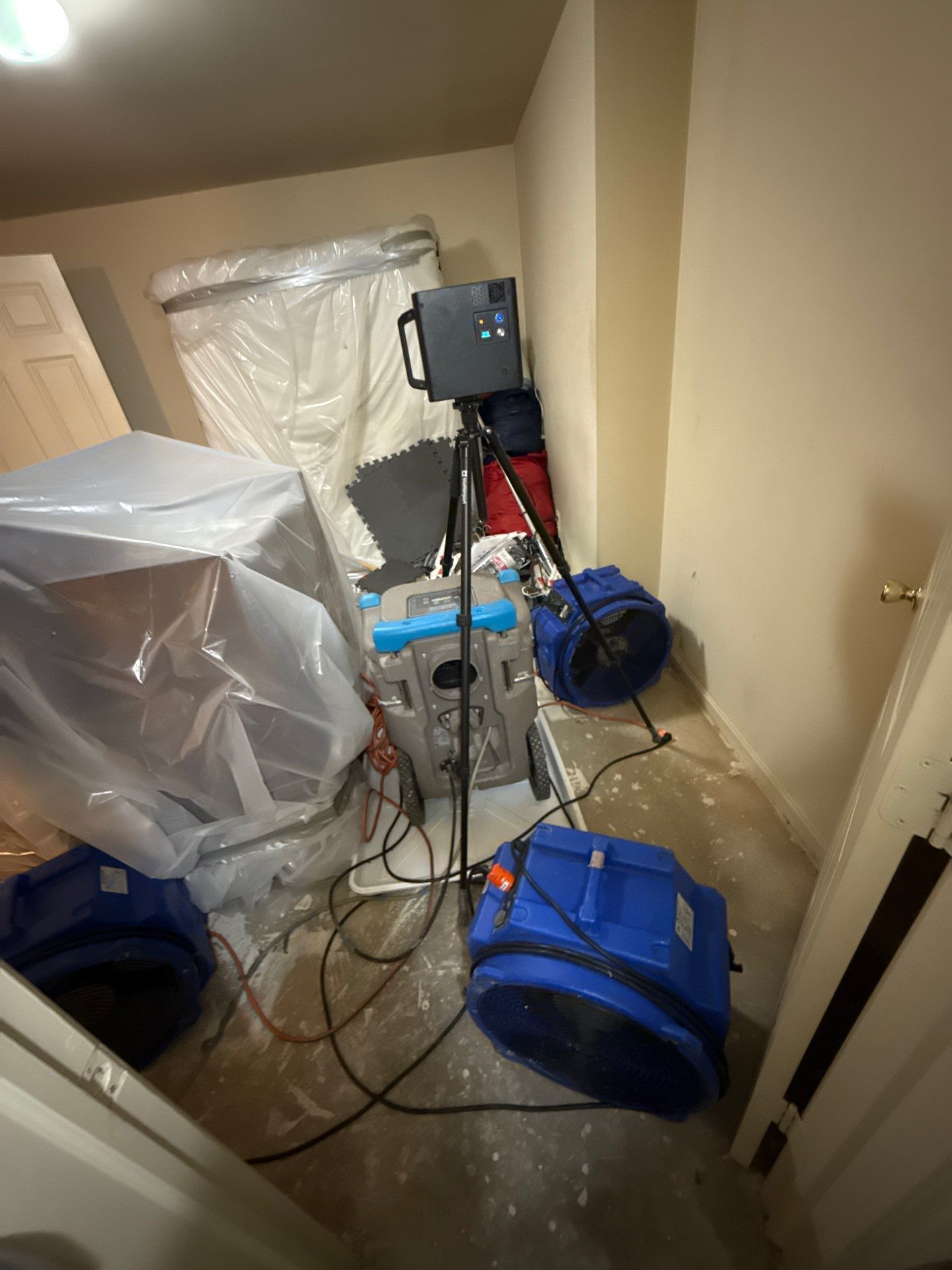 Continued dehumidification and air circulation in remediation process.