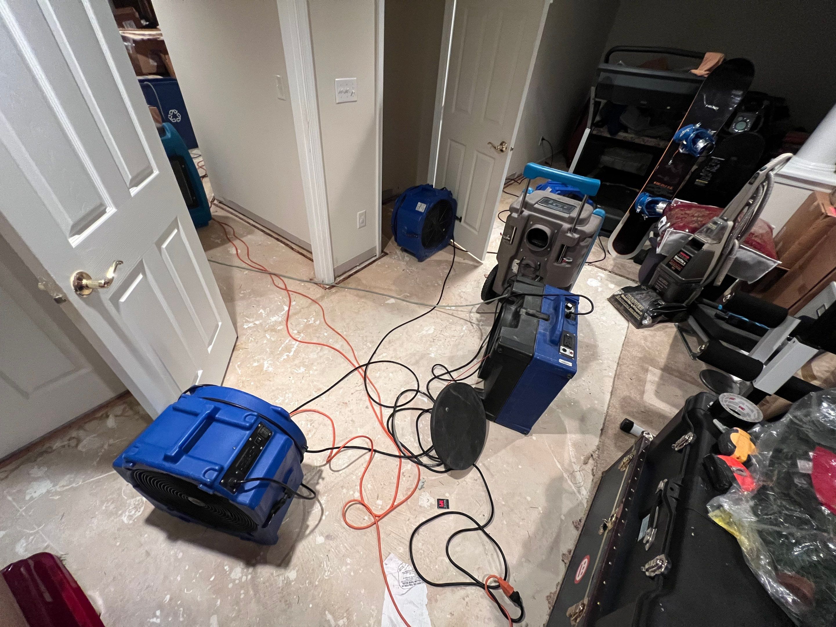 Thermal imaging reveals moisture distribution across wall cavity during Alexandria water damage assessment.