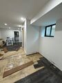Advanced drying phase with dehumidifiers and ventilation systems managing residual moisture in flooring and substructure.