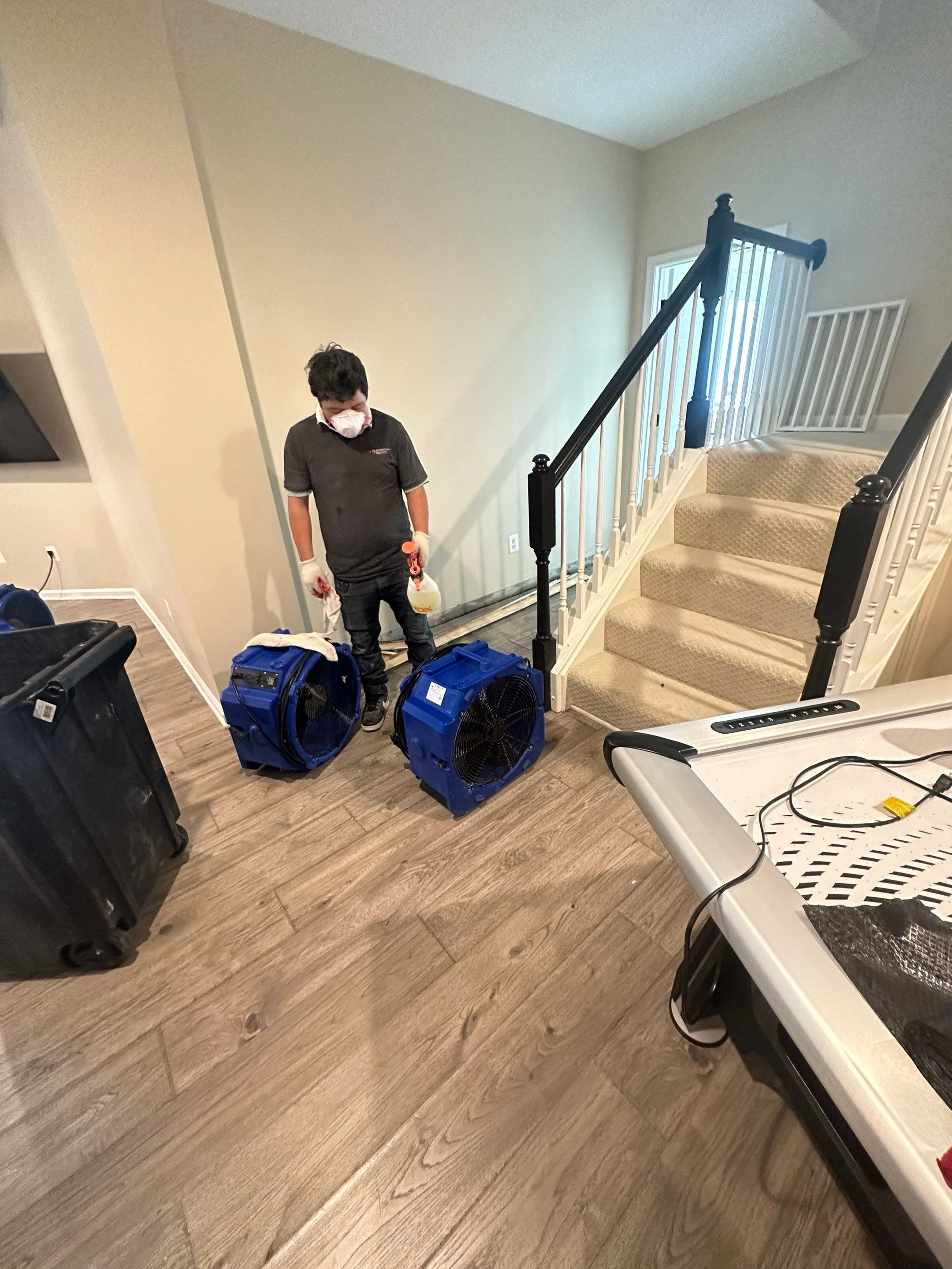 Dehumidification equipment positioned during mid-stage drying phase of water damage restoration in Aldie.