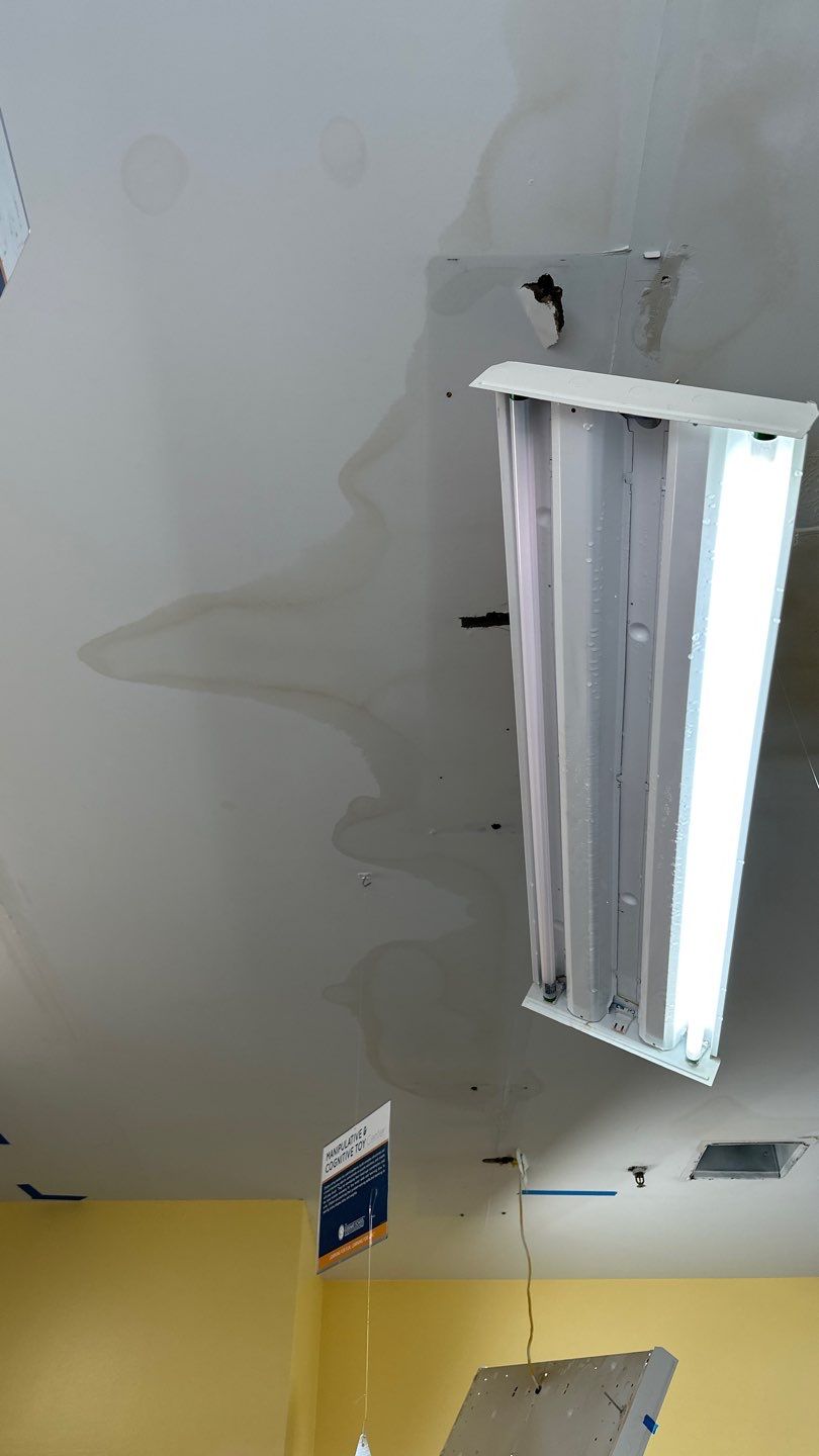 Dehumidification equipment positioned to remove residual moisture from affected areas.