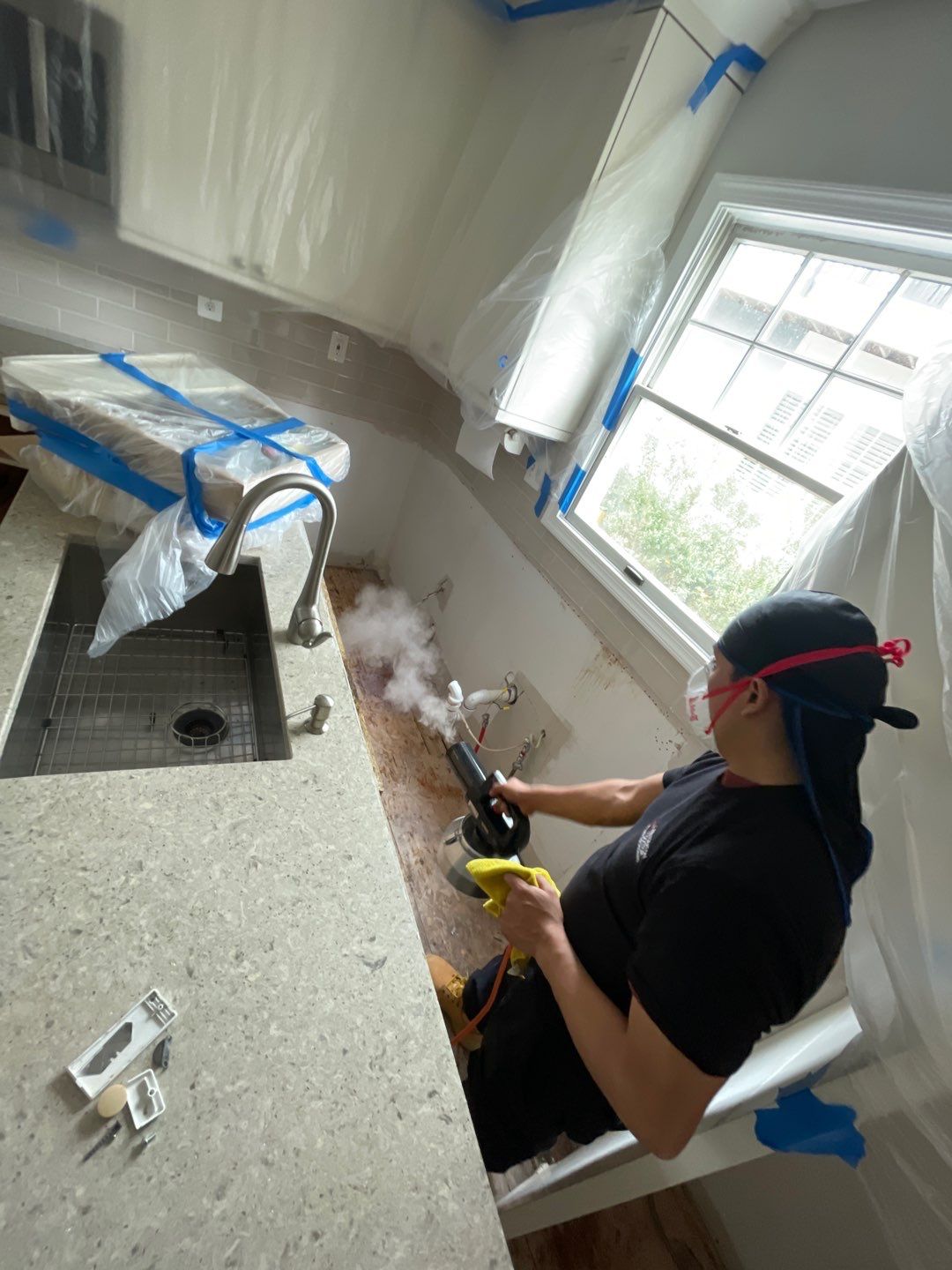 Drying equipment positioned to remove residual moisture from damaged materials.