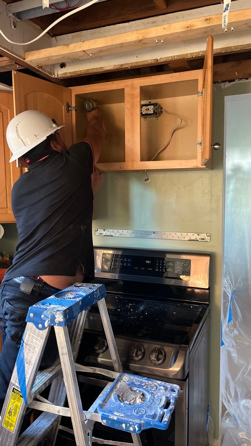 Continued moisture management during water restoration process, drying equipment operating in Sterling home.