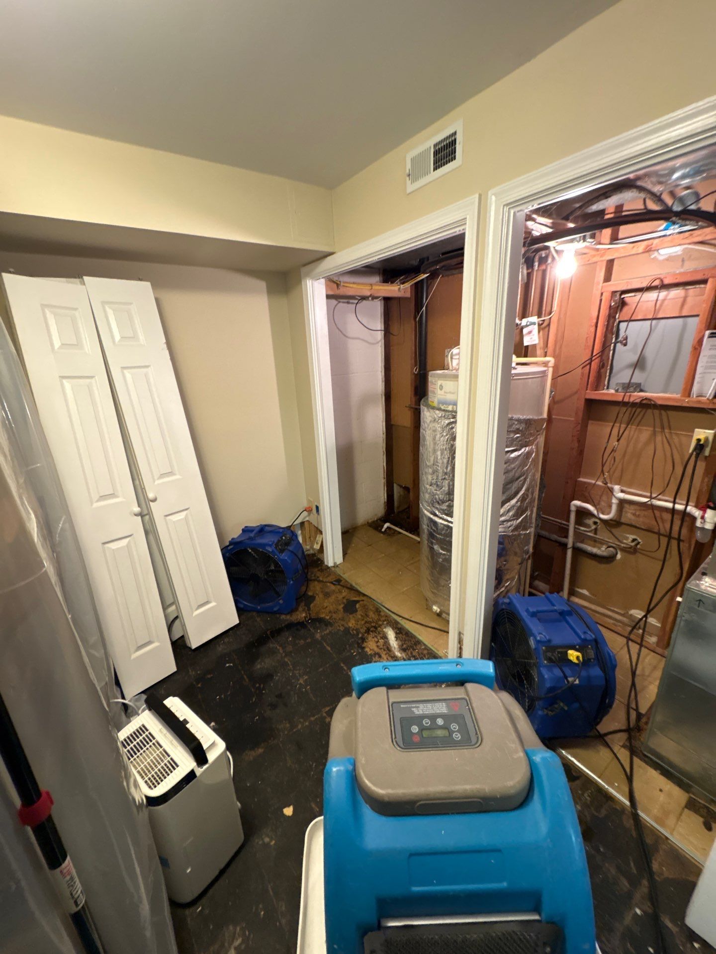 Drywall replacement in progress following water extraction and structural drying in Falls Church.
