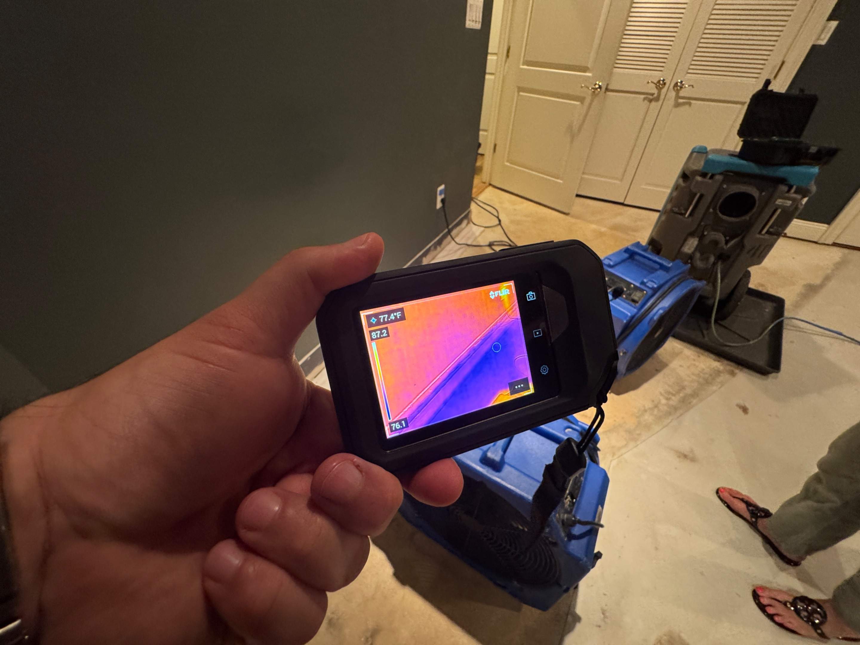 Dehumidification and air movement equipment deployed for water damage drying.