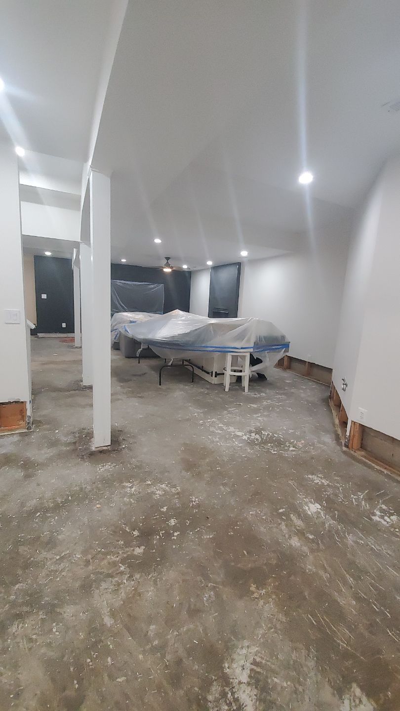 Final stage of water damage restoration in Fairfax showing cleared areas and completion of structural drying process.
