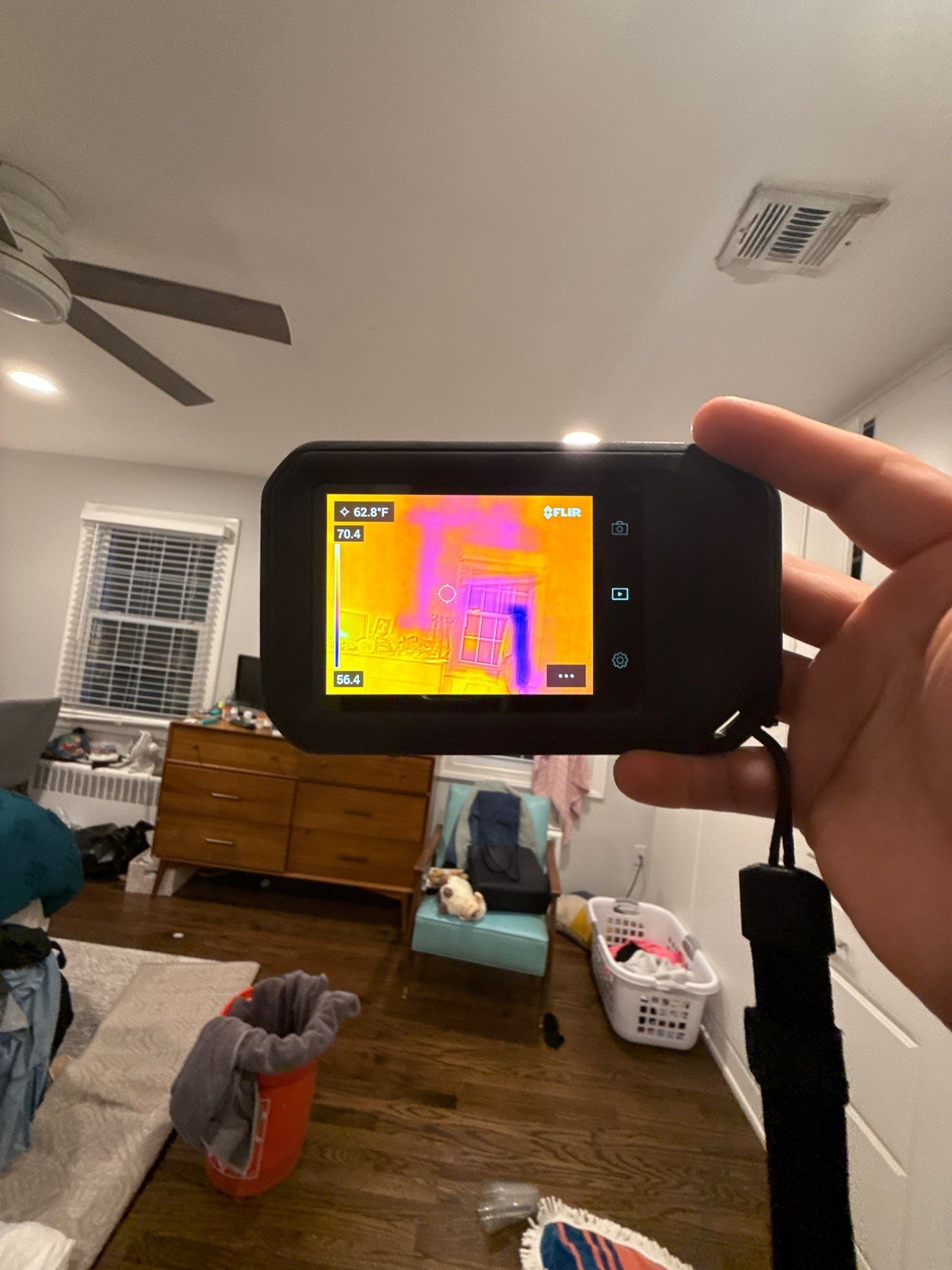 Dehumidification and air circulation equipment positioned to dry affected ceiling framing and substrate.