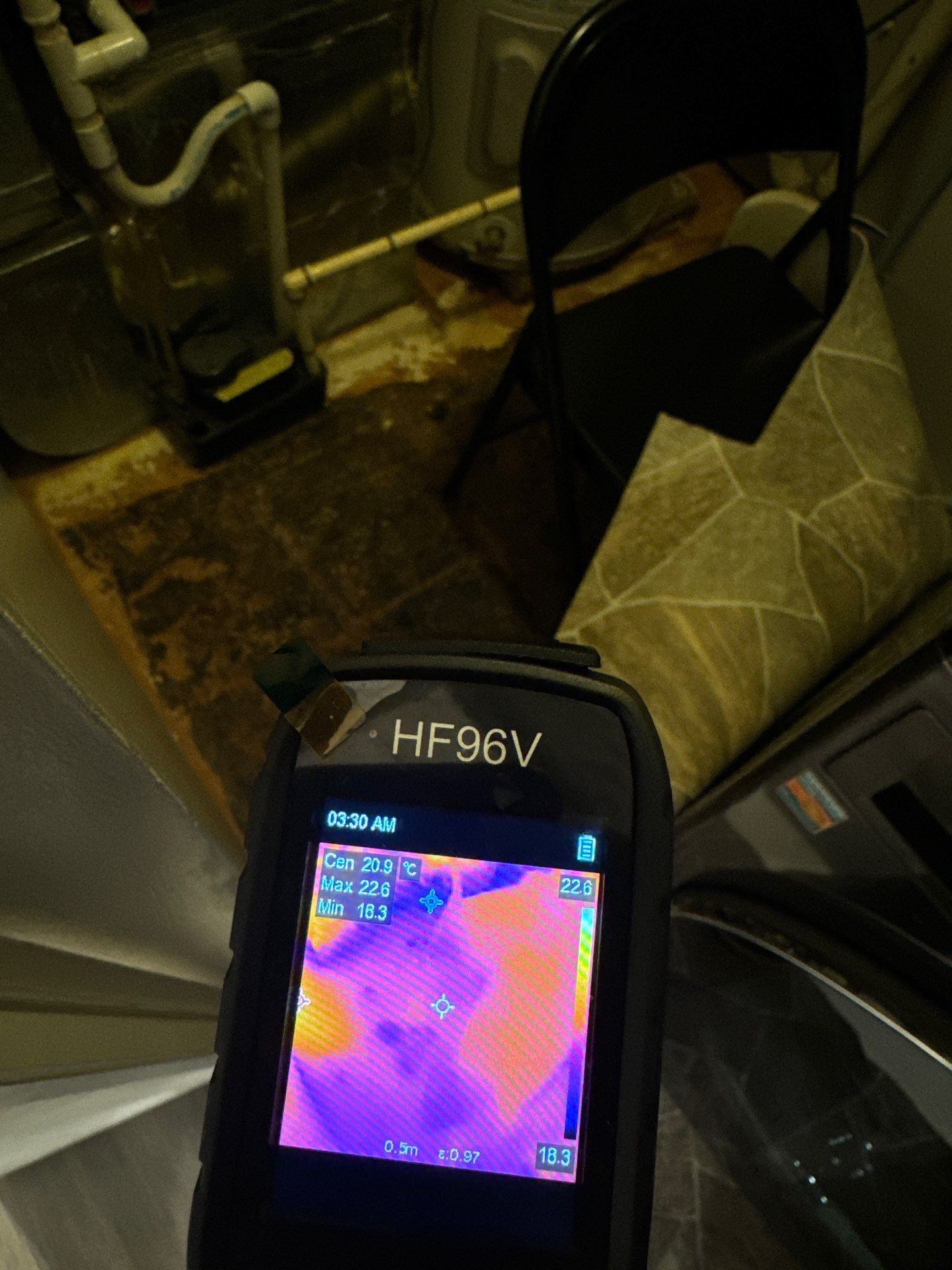 Mid-stage structural drying showing dehumidifier and air movement setup for water damage restoration in Sterling.