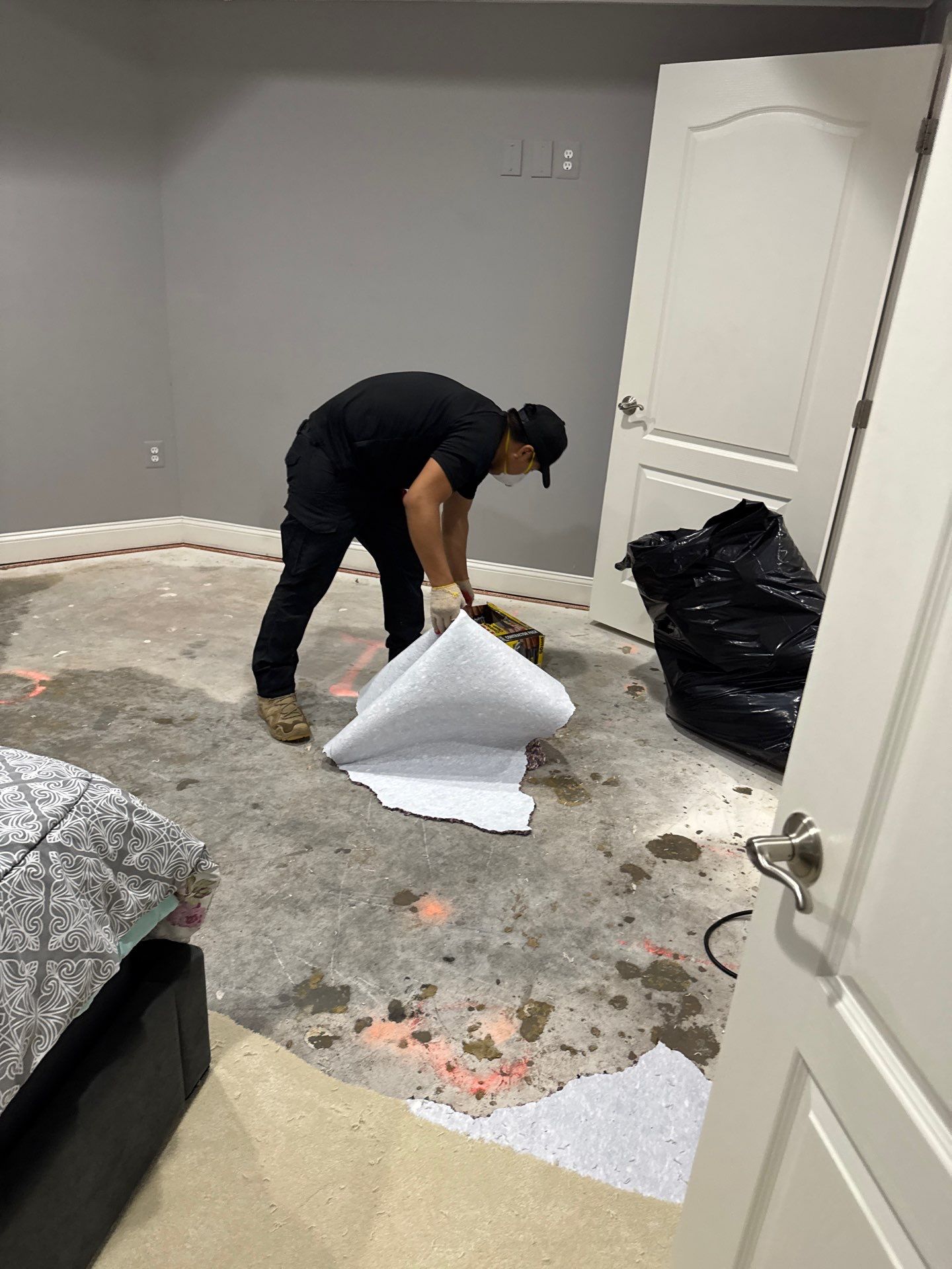 Structural drying equipment positioned throughout affected room during water restoration work.