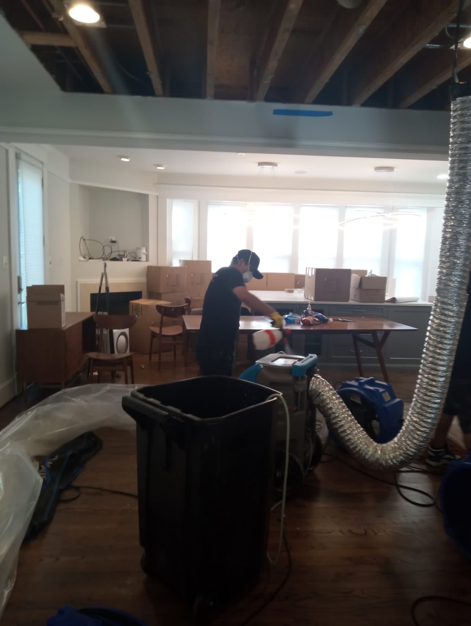 Structural drying in progress with dehumidification setup supporting ceiling repair work in Arlington.