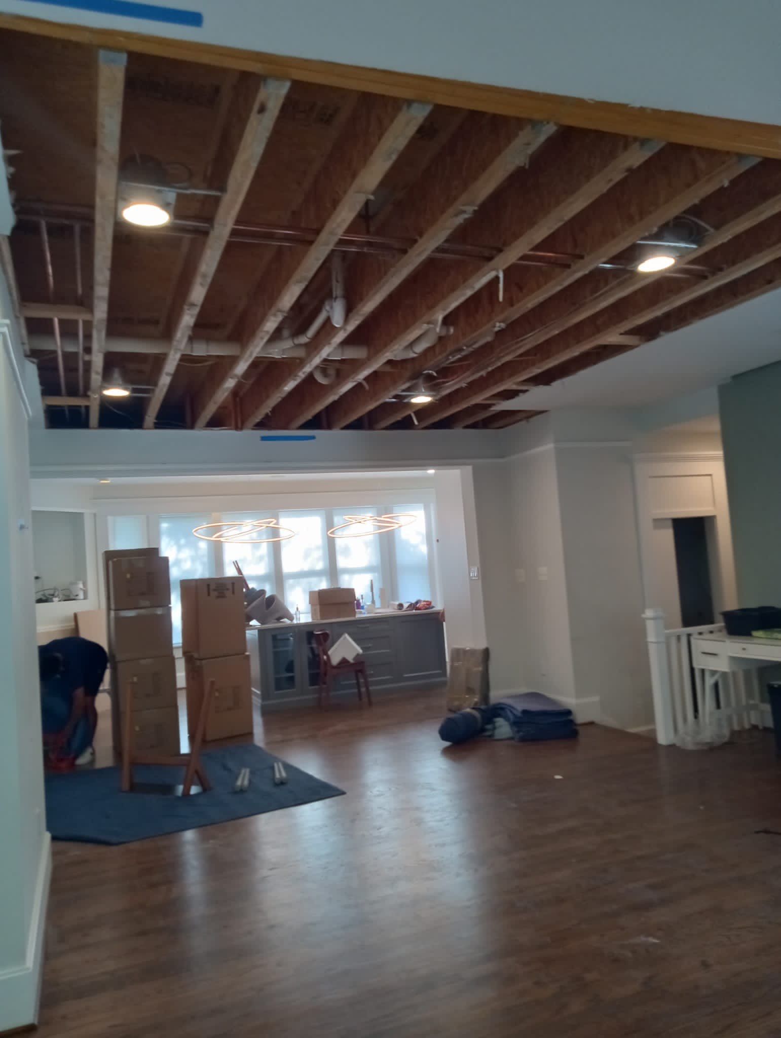Continued dehumidification and structural drying phase of Arlington water damage restoration project.
