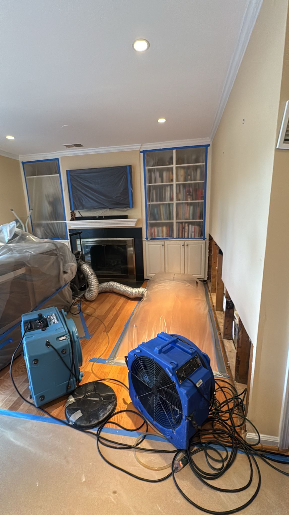 Baseboard replacement installed after water damage restoration and structural drying in McLean home.