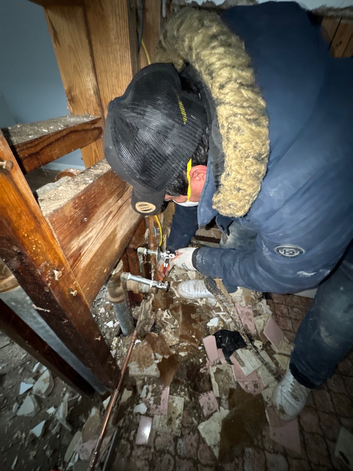 Restored ceiling section reinstalled after moisture remediation and antimicrobial treatment completed.