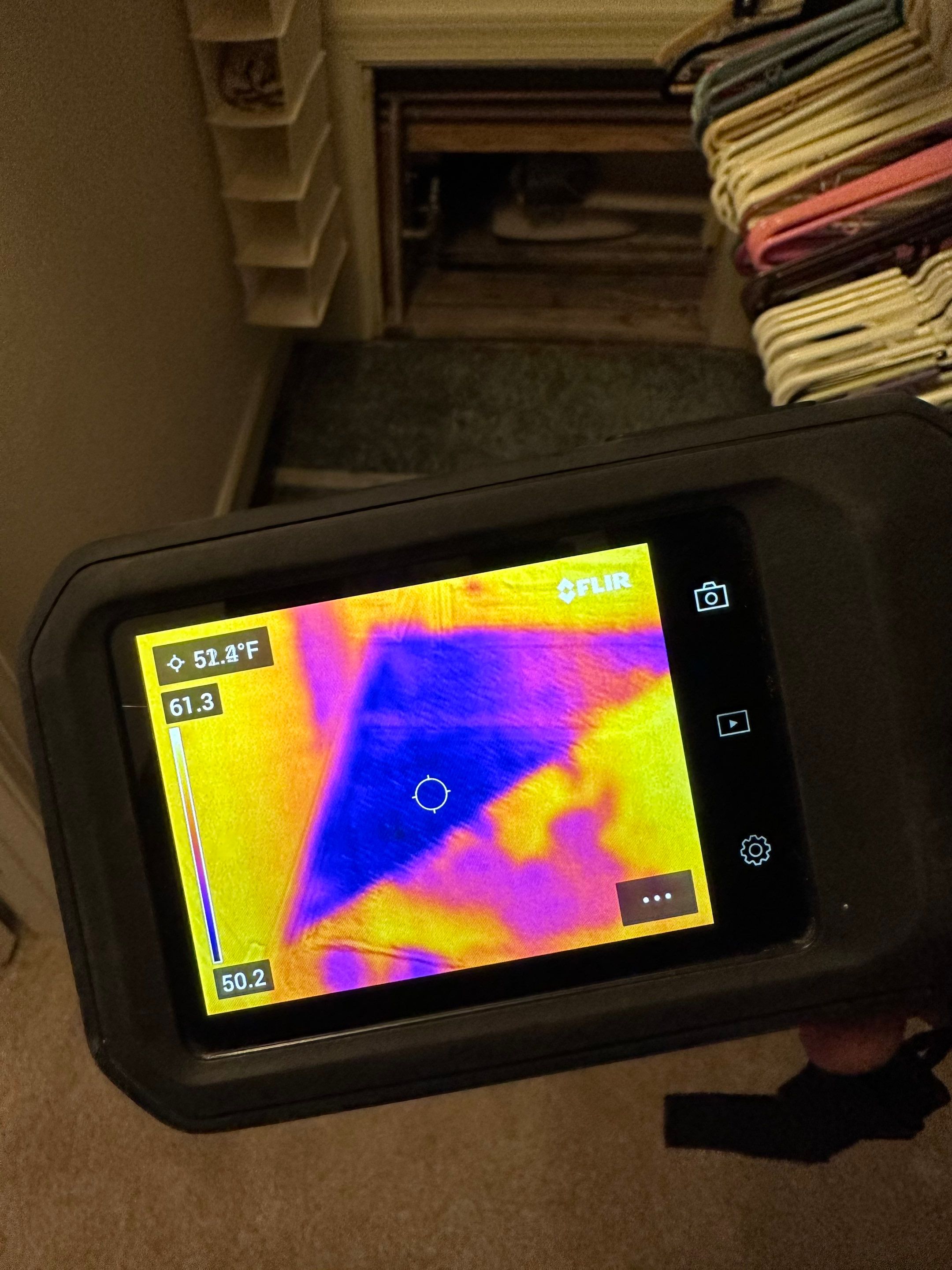 Dehumidification and air movement equipment positioned for drying phase of restoration work.