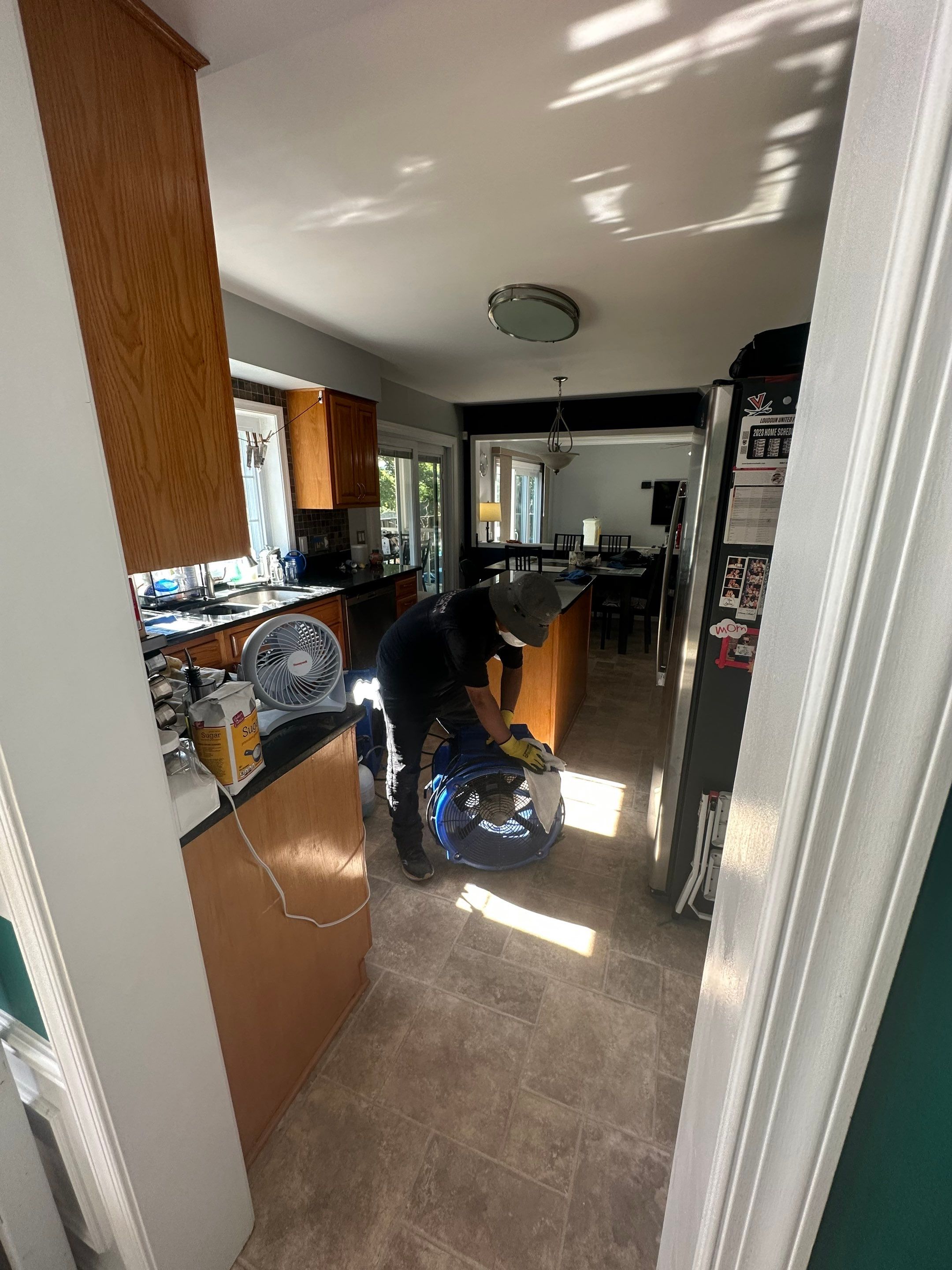 Thermal imaging camera documenting moisture distribution during water damage assessment in Leesburg.