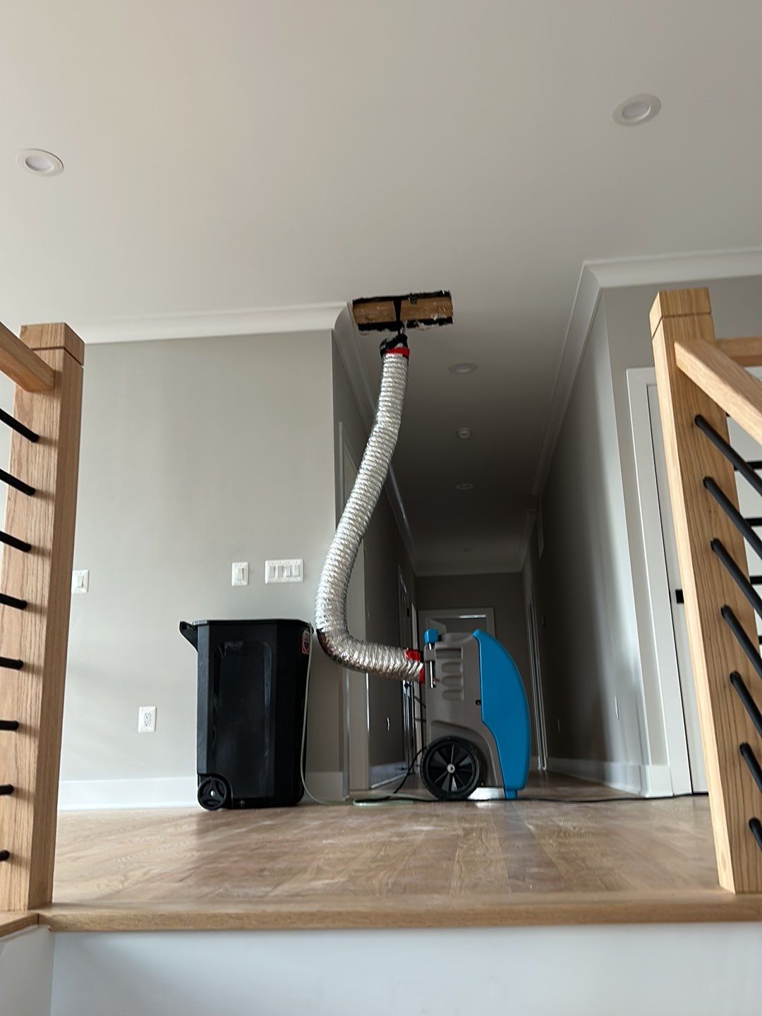 Dehumidification equipment positioned for structural drying phase of water restoration project.