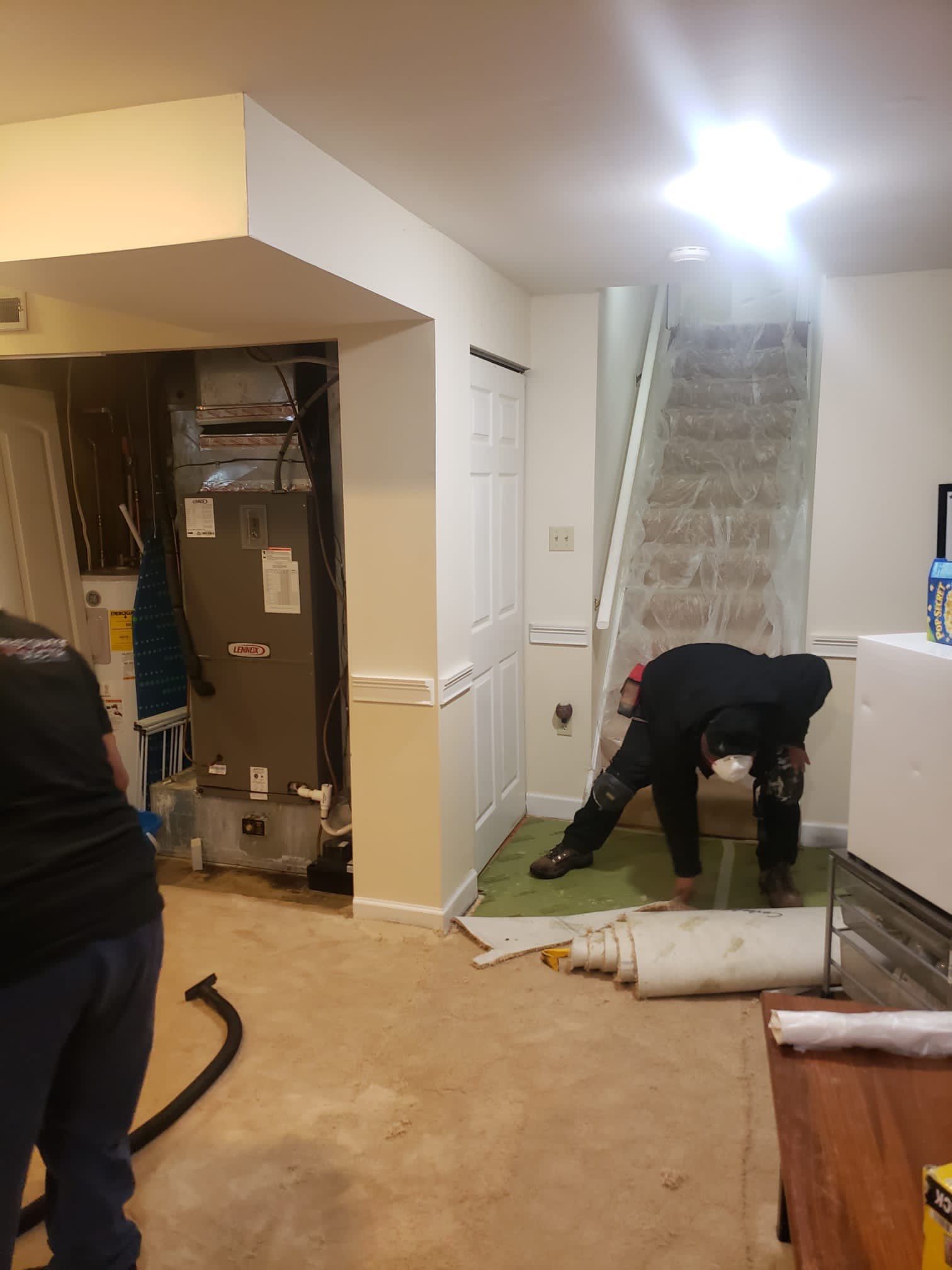 Completed water damage restoration in Chantilly with structural drying finished and flooring remediation work concluded.