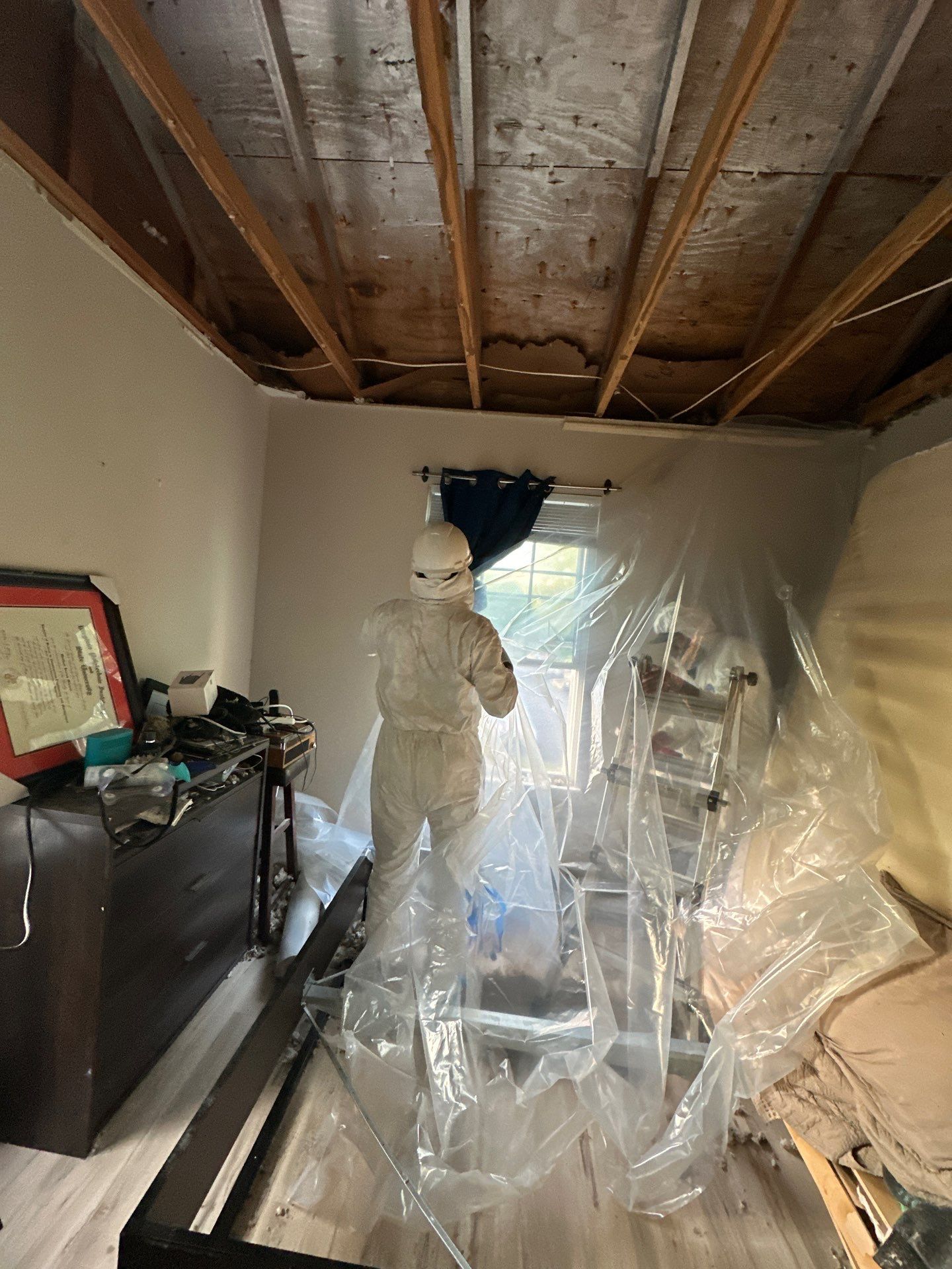 Air movers and moisture monitoring during active drying in Alexandria water restoration job.