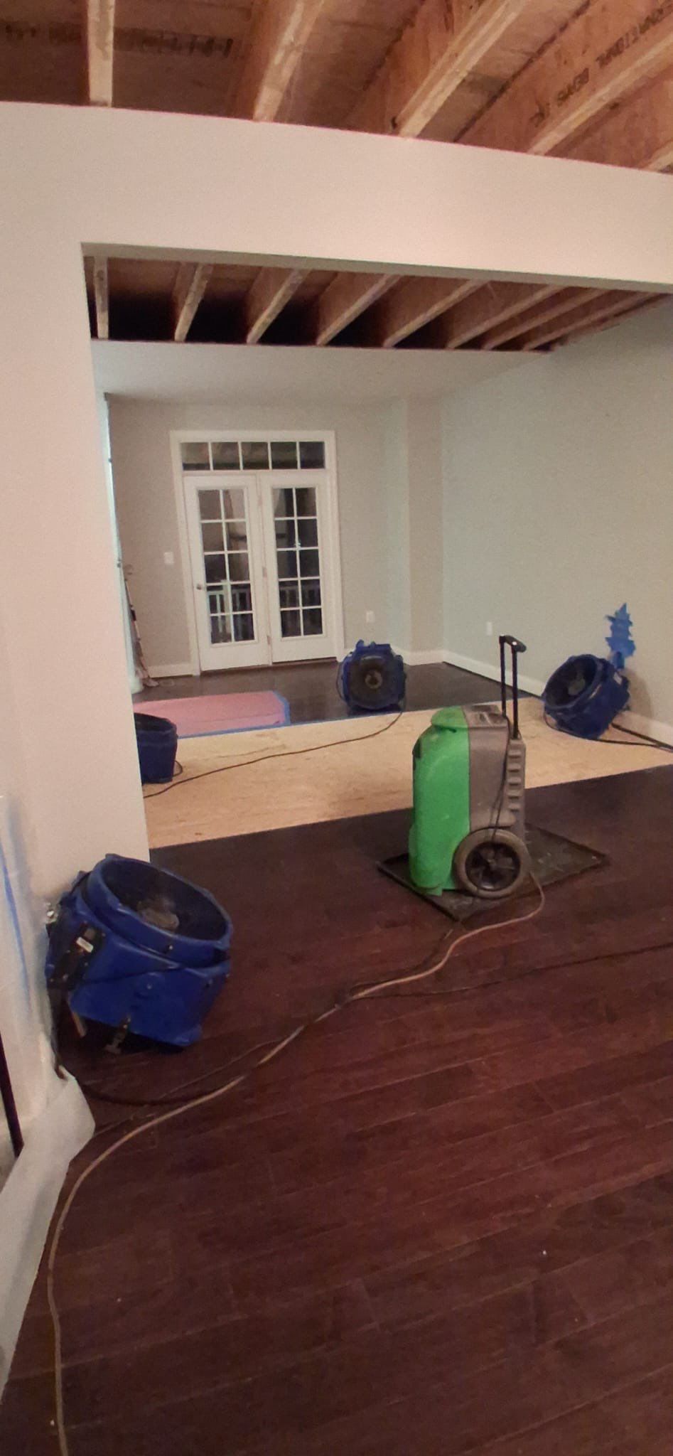 Final stage of mold remediation in Round Hill showing repaired ceiling and restored flooring.