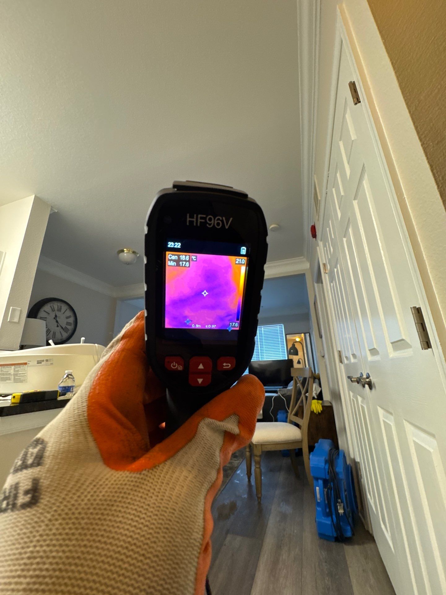 Thermal imaging camera documenting moisture distribution during water damage assessment in McLean.