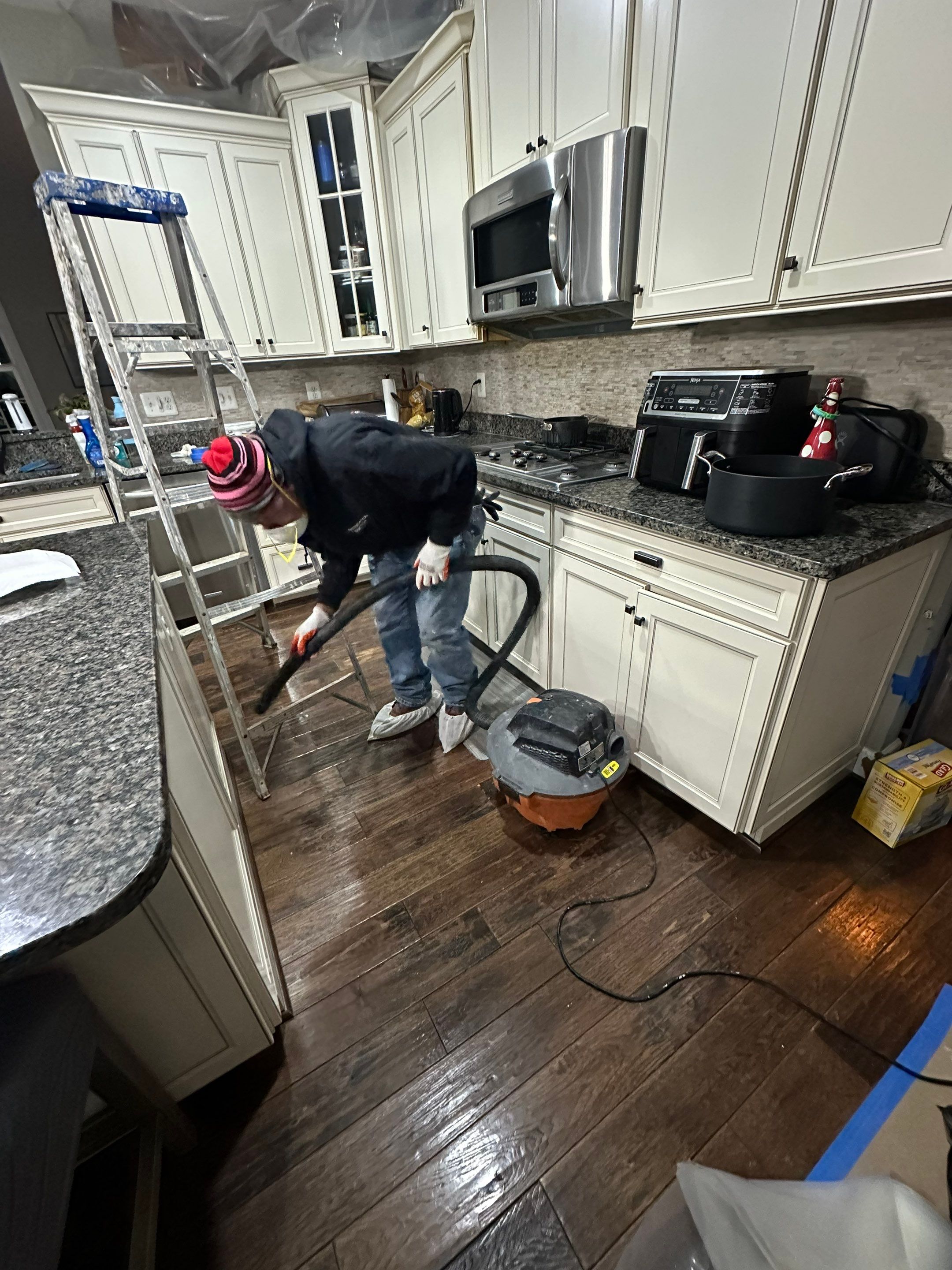 Dehumidification and air movement equipment operating during mid-stage water restoration in Leesburg.