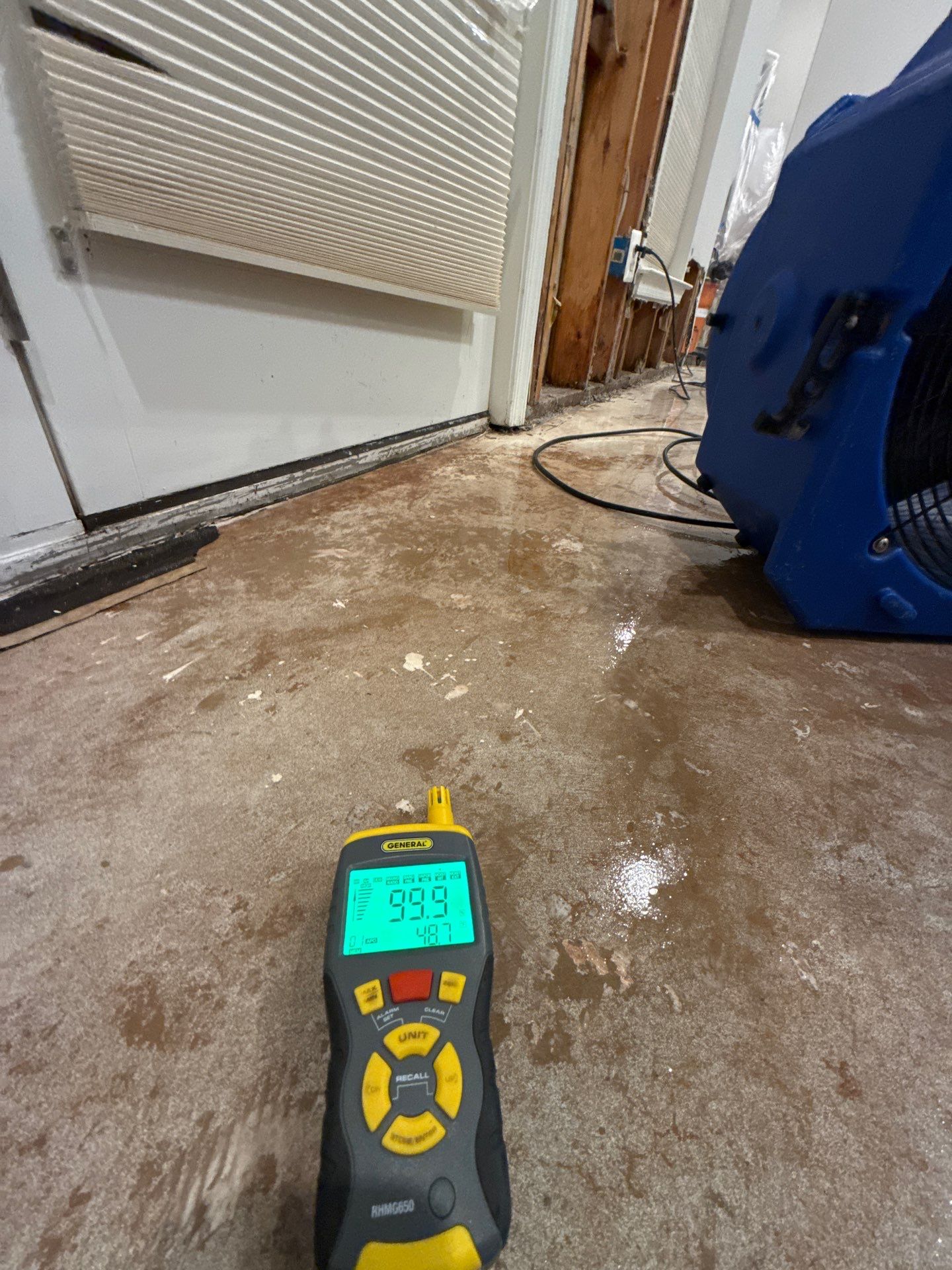 Structural drying equipment positioned to remove residual moisture from affected areas.