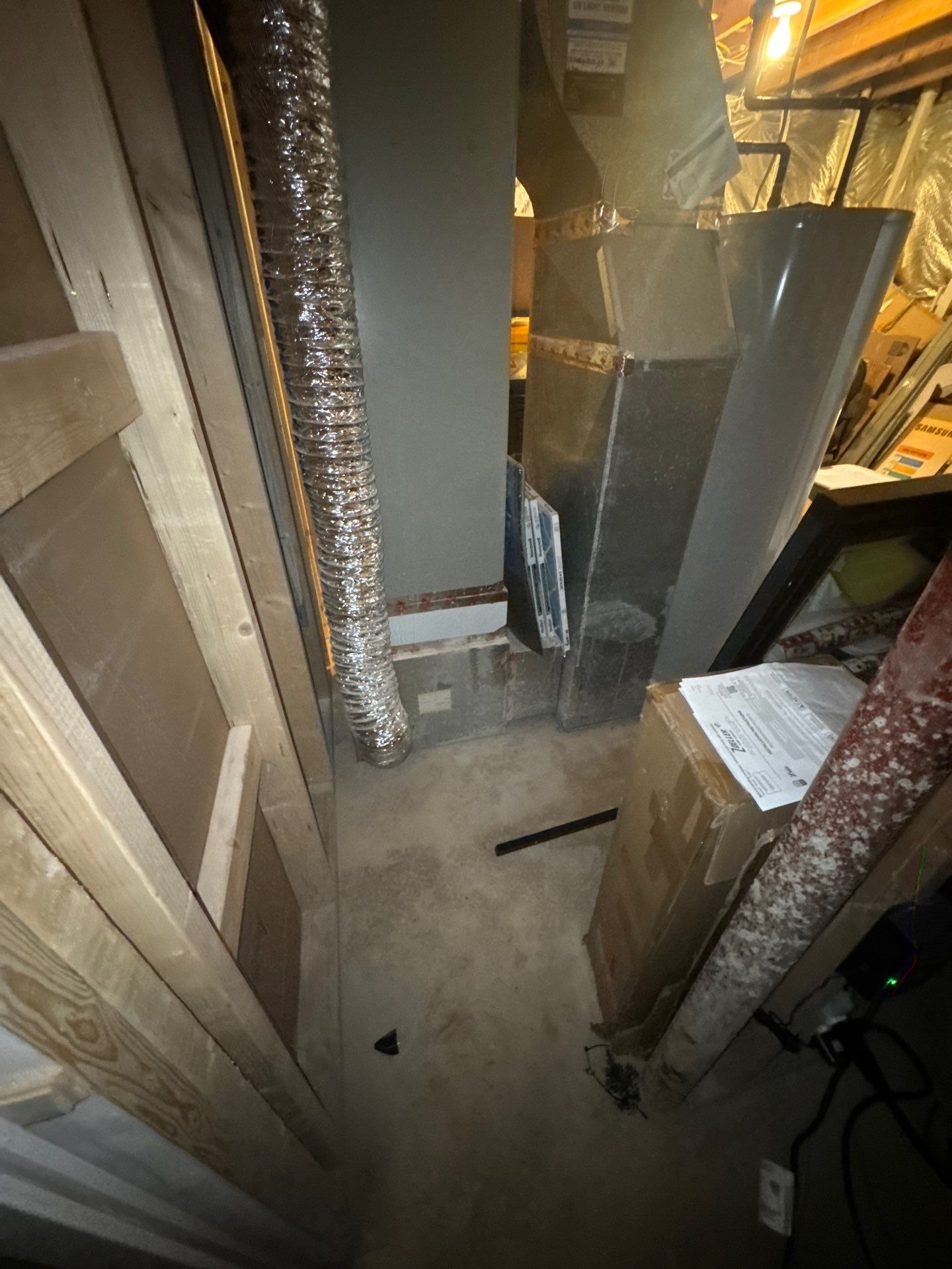 Structural drying equipment deployed mid-restoration to remove moisture from affected areas.